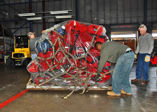 Workers at Wright-Patterson Air Force Base, Ohio palletize Ohio Task Force One equipment on Jan. 14, 2010, in preparation for deployment to Haiti. The urban search and rescue team, made up of approximately 80 first-responders from across Ohio and northern Kentucky, is staged at the base while awaiting airlift into Haiti. The team will join ongoing humanitarian and disaster relief operations following the recent earthquake. (U.S. Air Force photo/Ben Strasser)