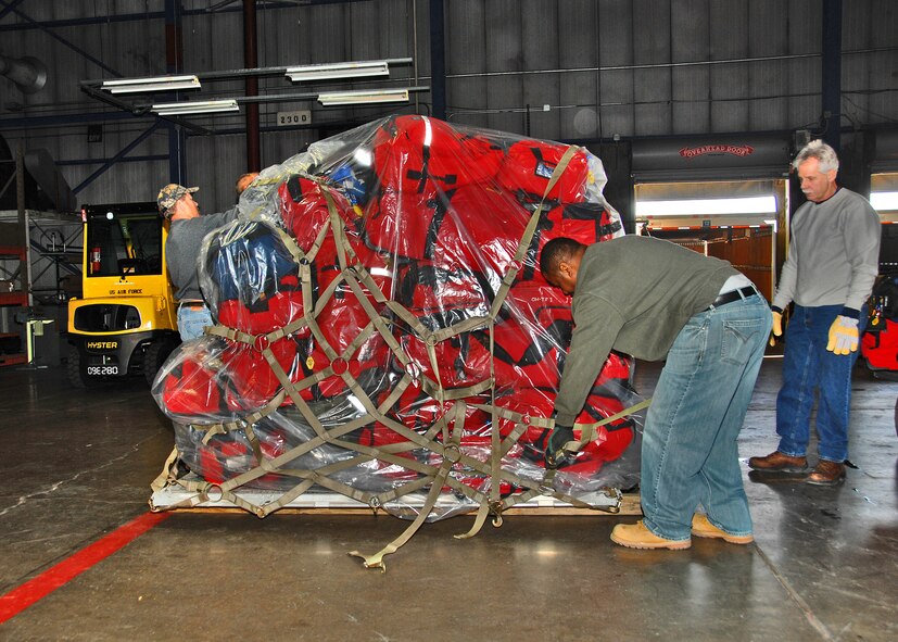Workers at Wright-Patterson Air Force Base, Ohio palletize Ohio Task Force One equipment on Jan. 14, 2010, in preparation for deployment to Haiti. The urban search and rescue team, made up of approximately 80 first-responders from across Ohio and northern Kentucky, is staged at the base while awaiting airlift into Haiti. The team will join ongoing humanitarian and disaster relief operations following the recent earthquake. (U.S. Air Force photo/Ben Strasser)
