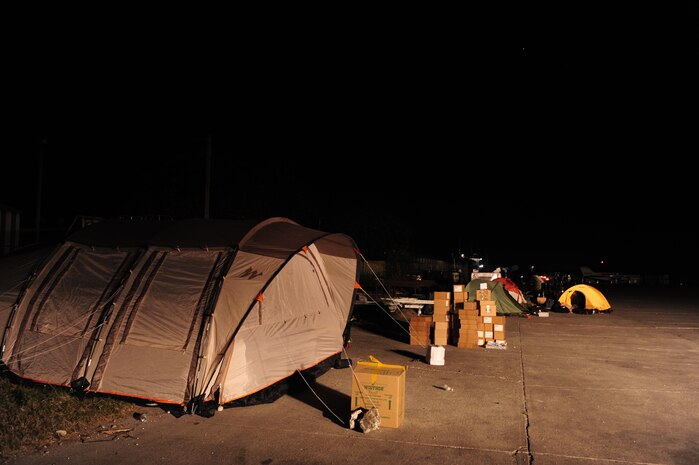 Tents on the edge of the runway at the Port-au-Prince airport, Haiti, provide shelter to U.S. military personnel participating in the relief effort in Haiti after a devastating earthquake, Jan. 15, 2010.  (U.S. Air Force photo by Staff Sgt. Joshua L. DeMotts) (Released)