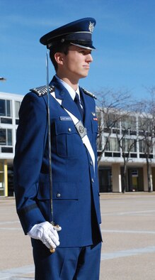 Air Force Academy Cadet 1st Class Andrew VanTimmeren stands at attention during the Cadet Wing's noon meal formation Jan. 10, 2010. Cadet VanTimmeren succeeded Cadet 1st Class Nathan Dial in a change-of-command ceremony in Mitchell Hall Jan. 5. (U.S. Air Force photo/Ann Patton)