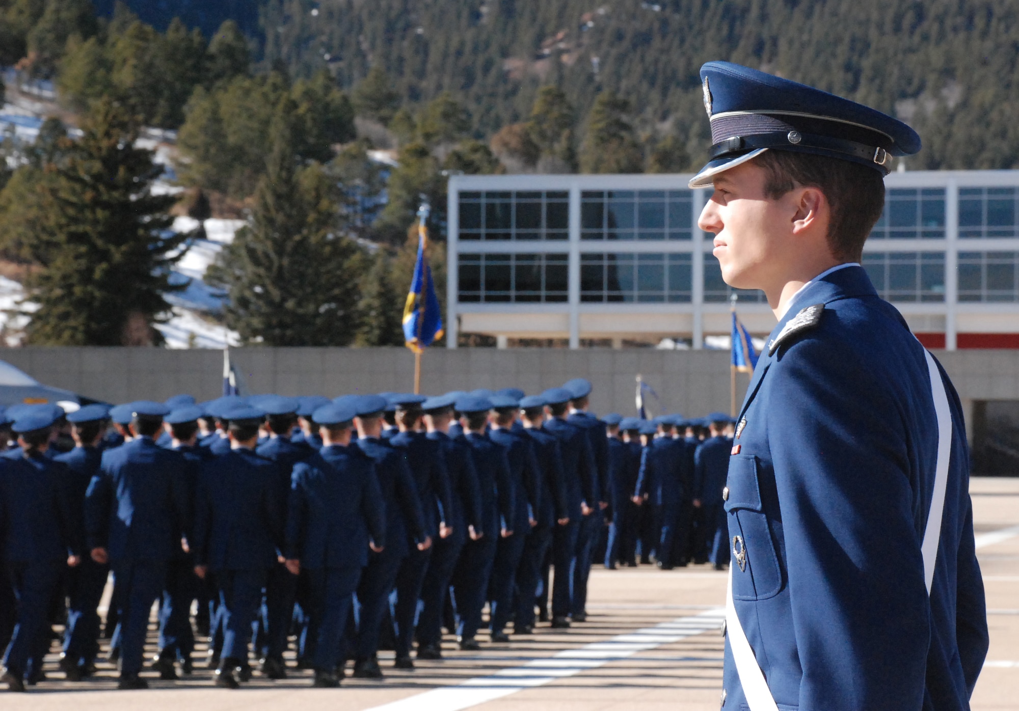 Air Force Academy Cadet 1st Class Andrew VanTimmeren observes a pass in review during a Cadet Wing noon meal formation Jan. 10, 2010, at the Academy in Colorado Springs, Colo. Cadet VanTimmeren succeeded Cadet 1st Class Nathan Dial as Cadet Wing commander for the Spring 2010 semester. (U.S. Air Force photo/Ann Patton)
