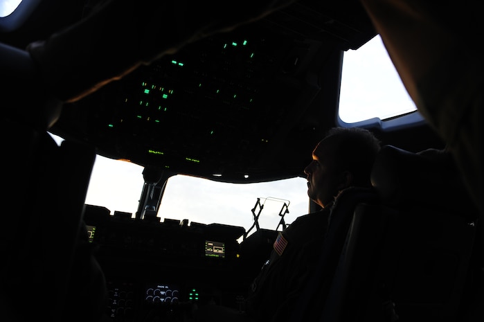 U.S. Air Force Maj. Mark Smith a reservist with the 317th Airlift Squadron, 437th Air Mobility Wing, Charleston Air Force Base, S.C., conducts pre-flight operations prior to departing in support of relief efforts to Haiti, Jan. 14, 2010, in the aftermath of a devastating earthquake.  (U.S. Air Force photo by Staff Sgt. Joshua L. DeMotts) (Released)