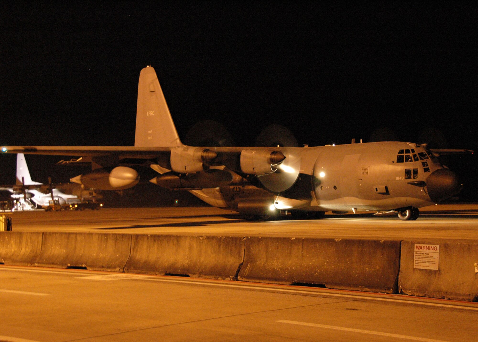 A 919th Special Operations Wing MC-130E Combat Talon I aircraft taxis from its Duke Field parking spot Jan. 14 on a mission to deliver personnel and equipment for the U.S. military's humanitarian relief operation aiding the earthquake-stricken nation of Haiti.  The Air Force Reserve unit is participating in Air Force Special Operations Command's rapid response effort for the impacted region. (U.S. Air Force photo/Dan Neely)

  