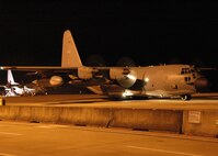 A 919th Special Operations Wing MC-130E Combat Talon I aircraft taxis from its Duke Field parking spot Jan. 14 on a mission to deliver personnel and equipment for the U.S. military's humanitarian relief operation aiding the earthquake-stricken nation of Haiti.  The Air Force Reserve unit is participating in Air Force Special Operations Command's rapid response effort for the impacted region. (U.S. Air Force photo/Dan Neely)

  