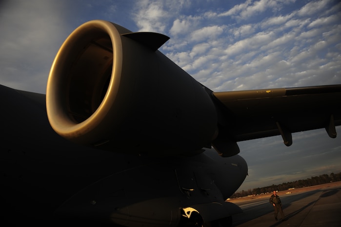 U.S.Air Force Maj. Mark Smith a reservist with the 317th Airlift Squadron, 437th Air Mobility Wing, Charleston Air Force Base, S.C., conducts a pre-flight walk around inspection prior to participating in a swift and coordinated relief effort to Haiti, Jan.14, 2010, in the aftermath of a devastating earthquake.  (U.S. Air Force photo by Staff Sgt. Joshua L. DeMotts) (Released)