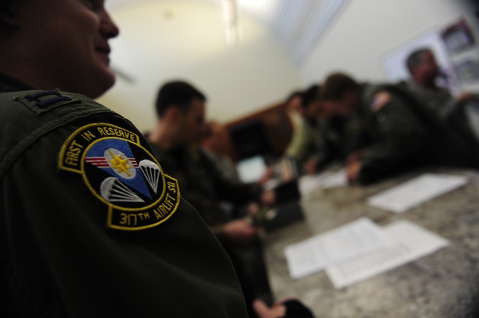U.S.Air Force Reservists from the 317th Airlift Squadron, 437th Air Mobility Wing, Charleston Air Force Base, S.C., request meals prior to participating in a swift and coordinated relief effort to Haiti, Jan.14, 2010, in the aftermath of a devastating earthquake.  (U.S. Air Force photo by Staff Sgt. Joshua L. DeMotts) (Released)
