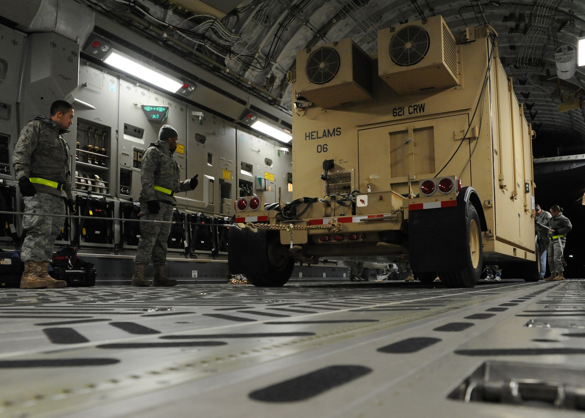 Equipment is loaded onto C-17 at Joint Base McGuire-Dix-Lakehurst, New Jersey, Jan. 15, 2010. The Charleston C-17 was used to transport equipment needed to aid the humanitarian effort in Haiti. (U.S. Air Force photo/Senior Airman Katie Gieratz)(RELEASED)