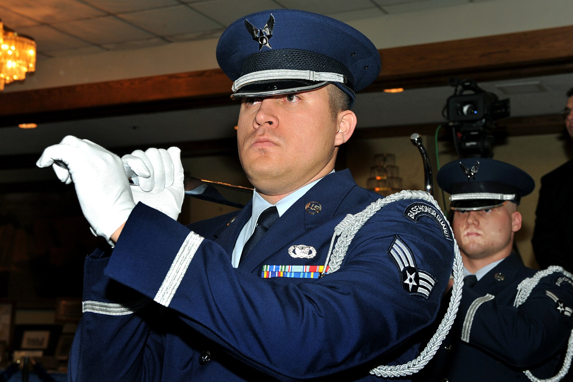 OFFUTT AIR FORCE BASE, Neb. - Senior Airman Matthew Solis, Barksdale AFB, La., and other honor guard members representing bases in Air Combat Command carry the ceremonial sword as part of the Order of the Sword ceremony honoring retired Gen. John D.W. Corley, former commander of Air Combat Command, at the Doubletree Hotel in Omaha, Neb., Jan. 13. The award was established by the U.S. Air Force enlisted corps to recognize and honor senior officers (colonels or above) and civilian equivalents, for "conspicuous and significant contributions to the welfare and prestige of the enlisted force and mission effectiveness."

U.S. Air Force photo by Charles Haymond
[CLEARED] Deborah Aragon
