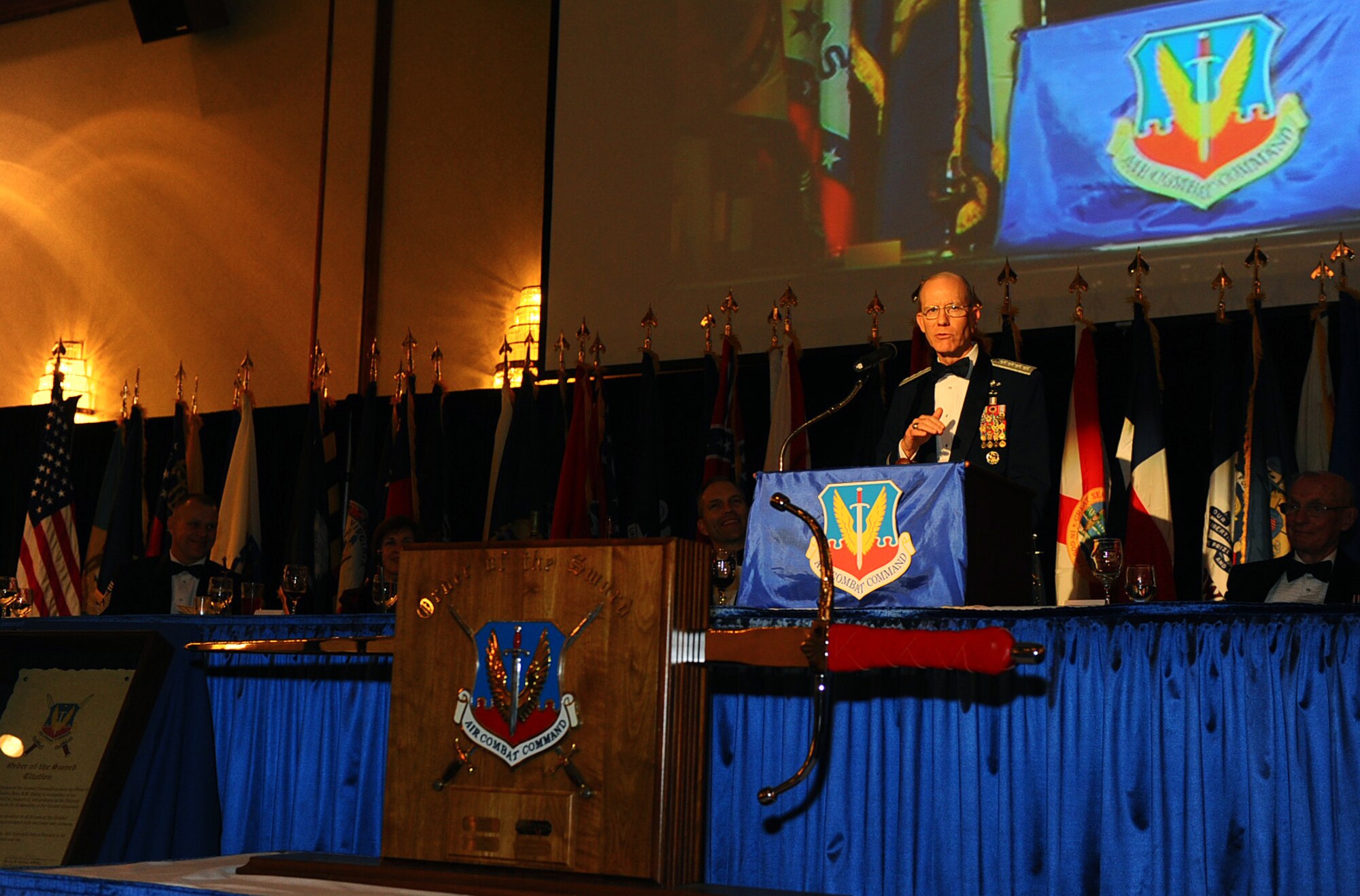 OFFUTT AIR FORCE BASE, Neb. - Retired Gen. John D.W. Corley, former commander of Air Combat Command, gives his acceptance speech in front of approximately 500 enlisted Airmen at an Order of the Sword Ceremony in his honor at the Doubletree Hotel in Omaha, Neb., Jan. 13.  The Order of the Sword is the highest award given by the U.S. Air Force enlisted corps.    U.S. Air Force photo by Josh Plueger