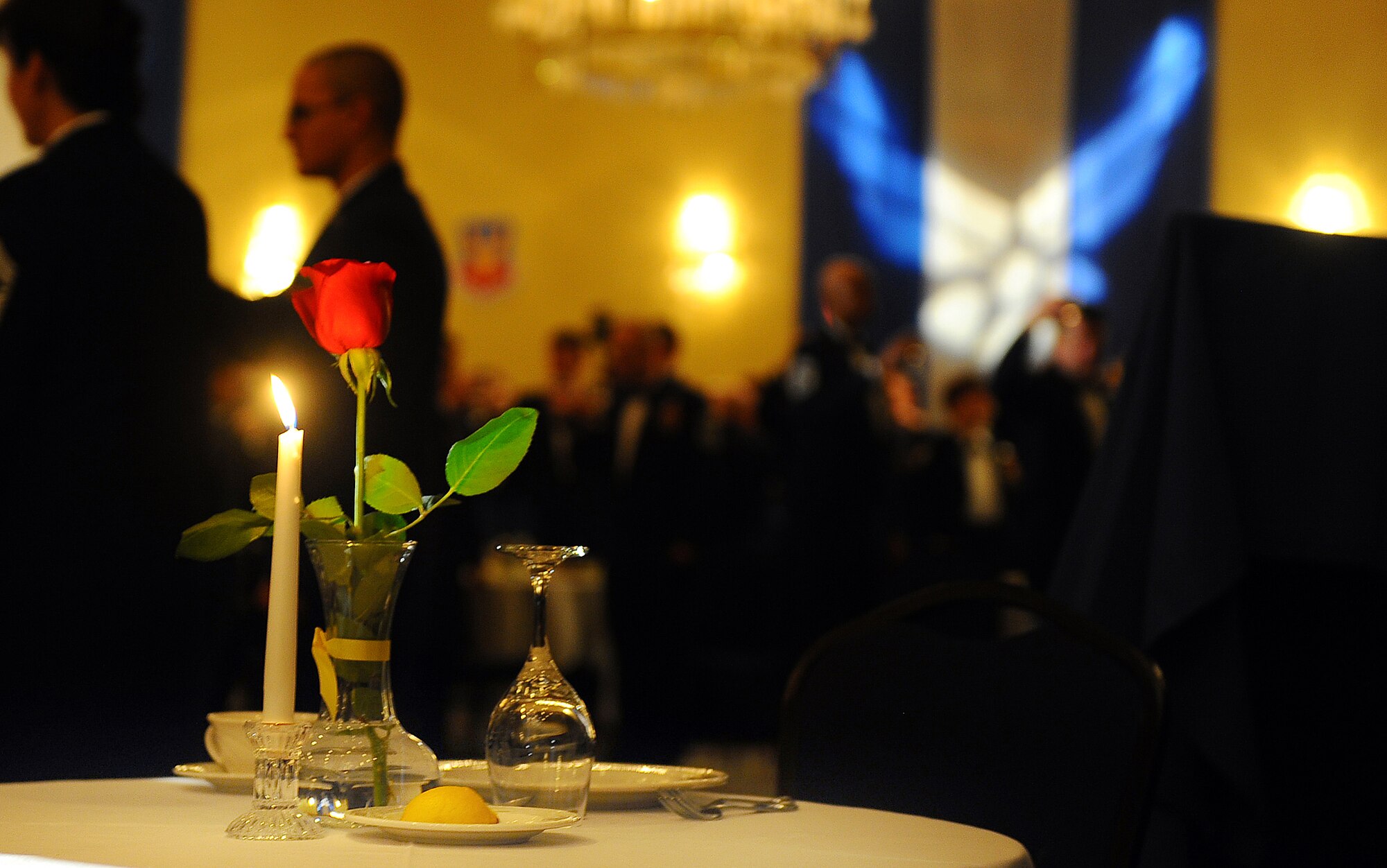OFFUTT AIR FORCE BASE, Neb. - A candle flickers on the ceremonial Prisoner of War/Missing in Action table during an Order of the Sword ceremony honoring former Air Combat Command Commander Retired Gen. John D.W. Corley at the Doubletree Hotel in Omaha, Neb., Jan. 13. Similar tables are set up during most military events as a reminder of Americans who have not returned to U.S. soil. The Order of the Sword is the highest honor awarded by the U.S. Air Force enlisted corps.

U.S. Air Force photo by Josh Plueger
