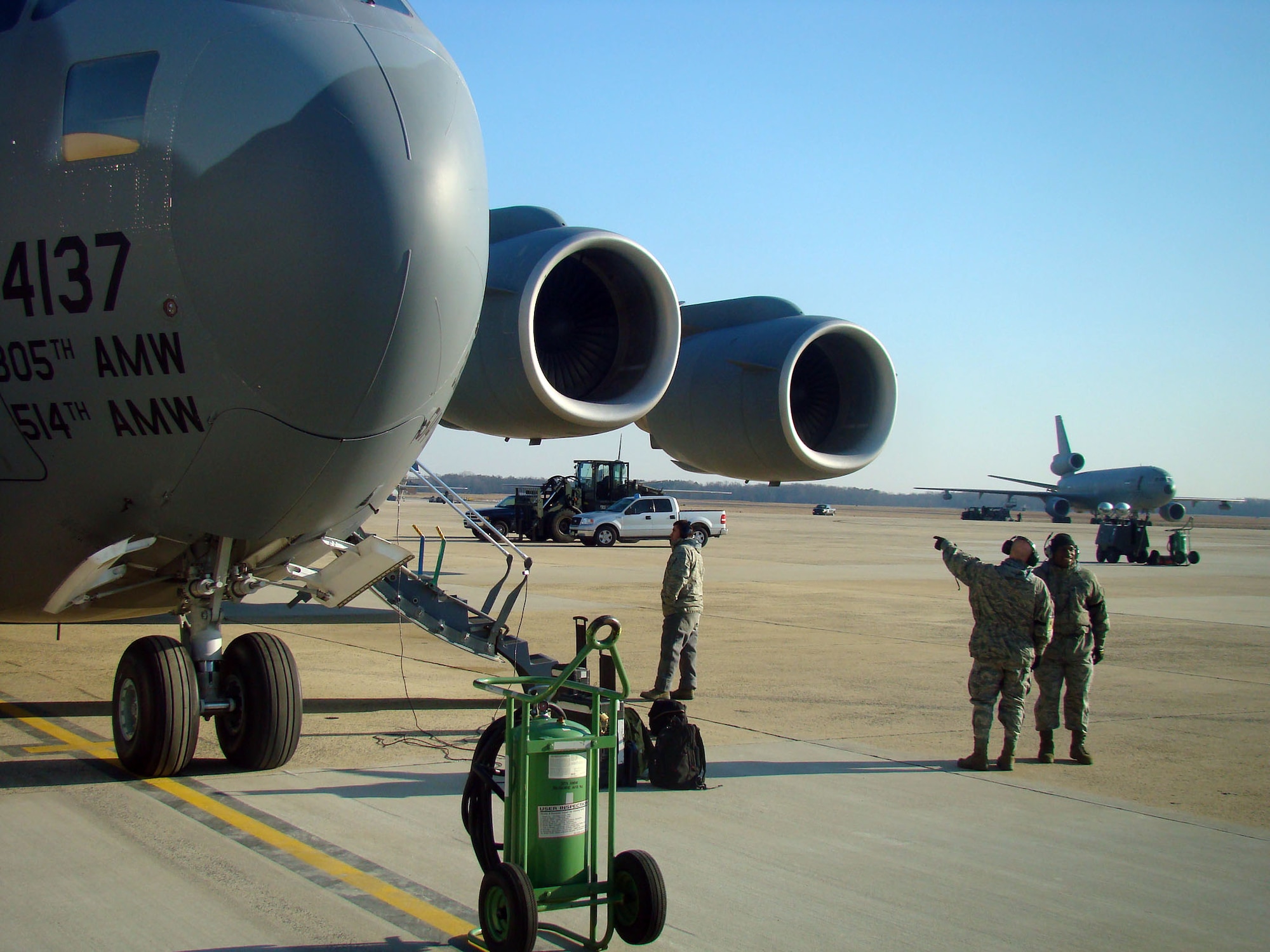 JOINT BASE MCGUIRE-DIX-LAKEHURST, N.J. -- Members of Joint Base McGuire-Dix-Lakehurst here prepared a C-17 Globemaster III for departure to the Toussaint Louverture International Airport, Haiti, Jan. 14. The jet would carry 21 passengers and six crew members who would be squeezed in among 44 tons of cargo on the 305th Air Mobility Wing asset to support relief operations in response to a devastating earthquake in the area. (U.S. Air Force Photo by Tech. Sgt. Denise Johnson)