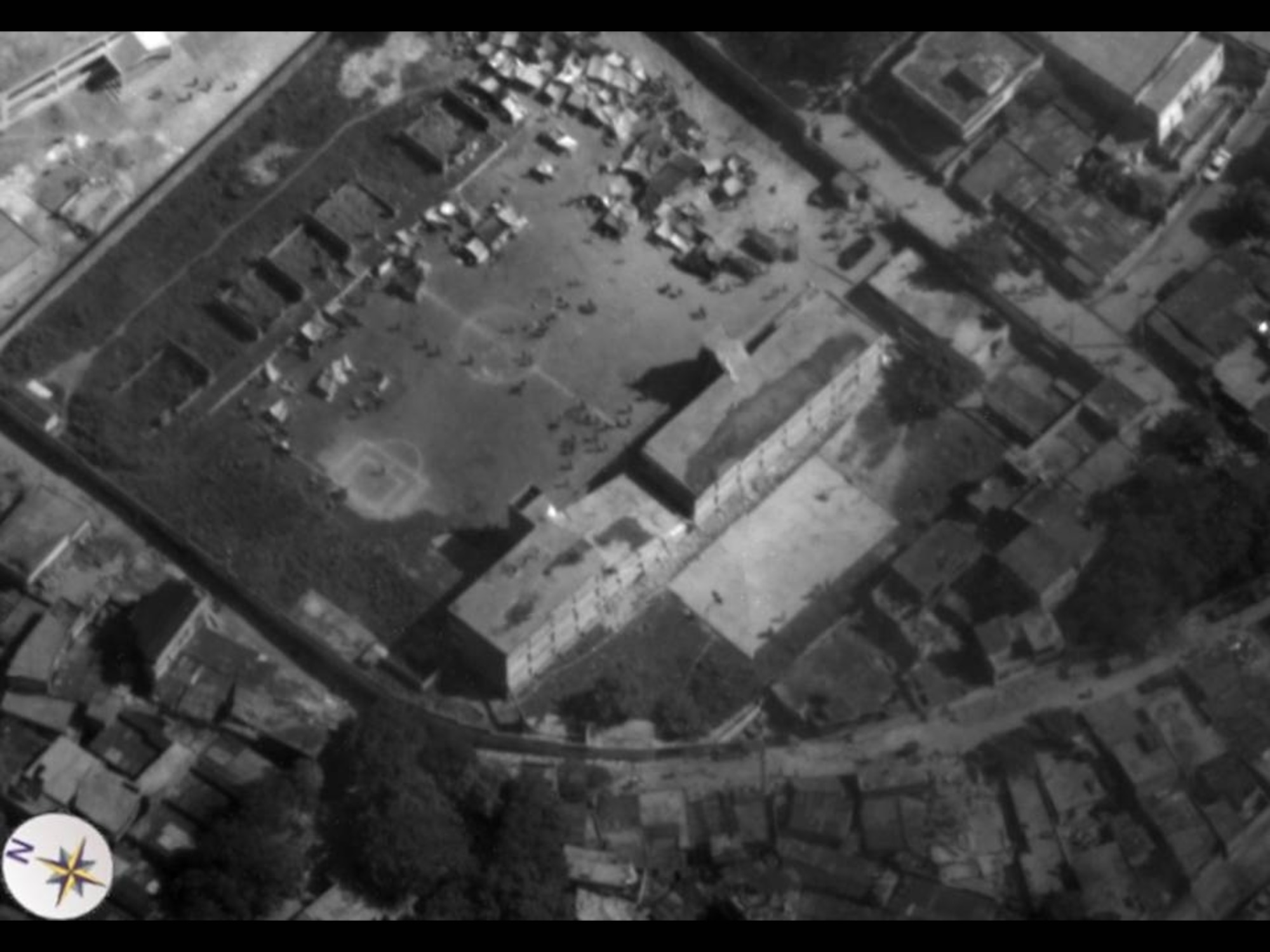 An aerial view of earthquake victims gathering in a soccer field in Haiti from an Air Force Global Hawk unmanned aircraft Jan. 14. Aerial images are providing planners valuable situation awareness as they coordinate U.S. military support to the Haiti relief effort. (U.S. Air Force photo)