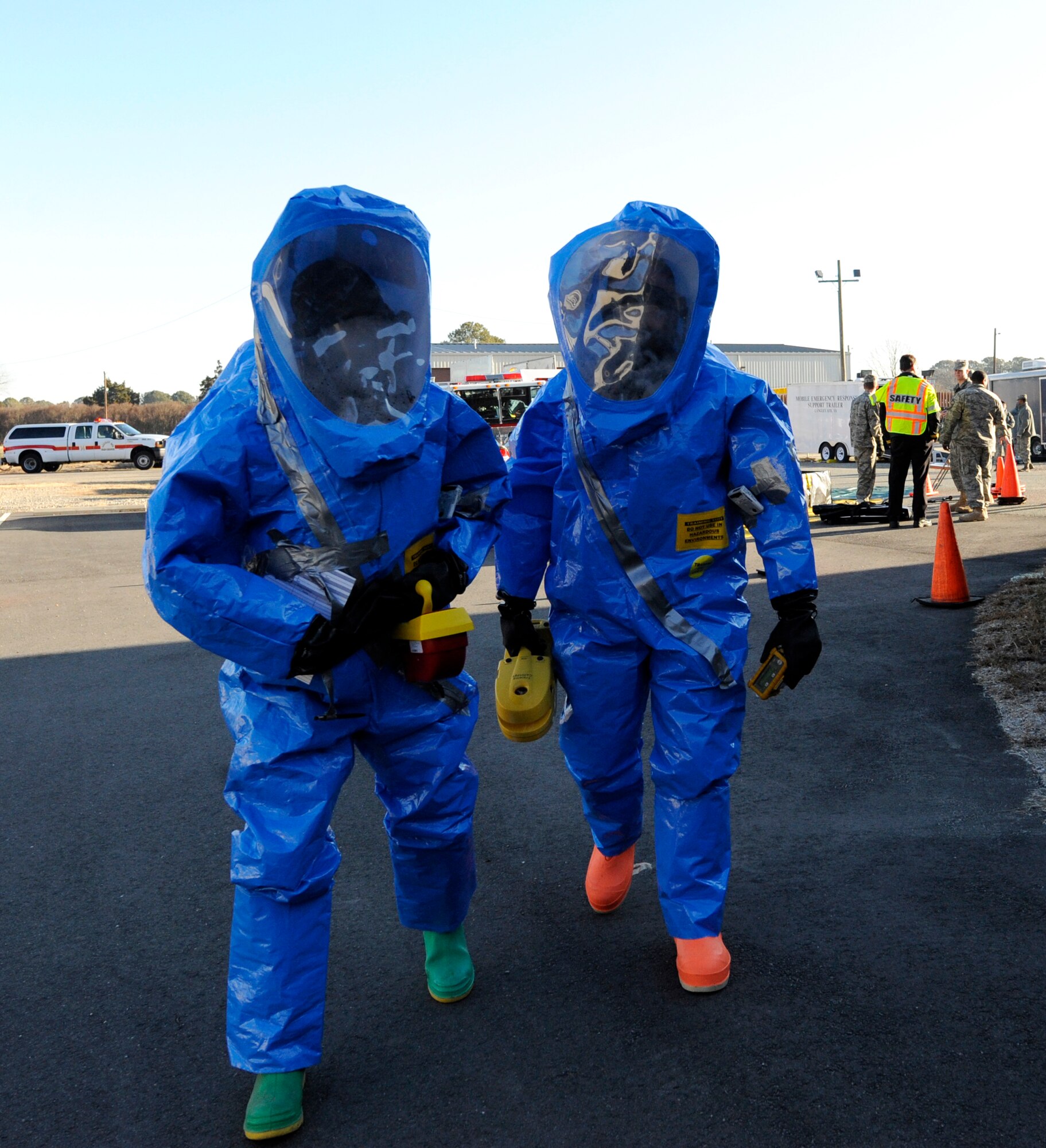 LANGLEY AIR FORCE BASE, Va. – Tech. Sgt. Michael Woodburn, 633d Aerospace Medicine Squadron, and Senior Airman William Volpenhein, 633d Civil Engineer Squadron, head for building 1352 to scan for hazardous materials during a Chemical Biological Radiology Nuclear Challenge Jan. 14. The fifth annual CBRNE challenge is an exercise that tests the base’s hazardous incident response capabilities. (U.S. Air Force photo/ Senior Airman Dana Hill)