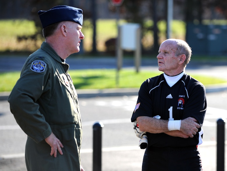 Col. Thomas J. Owens II, 106th Rescue Wing Commander, speaks to Hans Luhmer, who helped make the event happen and who also goal tended during the chairity game on November 8, 2009.

(Official U.S. Air Force photo/Senior Airman Chris S. Muncy/released)