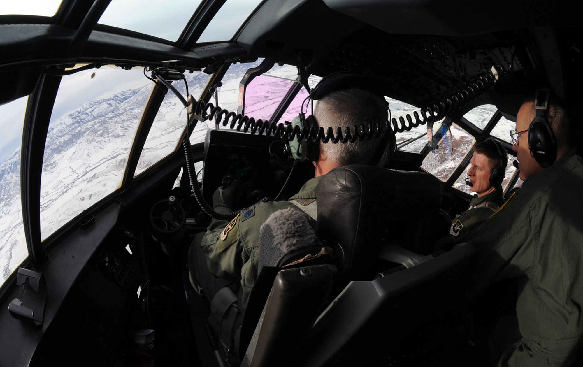 Air Force pilots Lt Col Pac Smith (left) and Maj Patrick Leonard, 514 FLTS, fly a Marine Corps C-130J Hercules with Gen Donald Hoffman, AFMC commander onboard Jan. 11. General Hoffman visited Hill AFB Jan. 11-12. (USAF photo by Alex Lloyd)