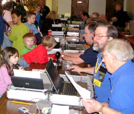 Georgia Child Identification Program volunteers record identification
information for children at the Robins Youth Center during an event held
here this summer.
