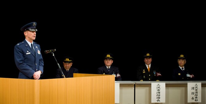 MISAWA CITY, Japan -- Col. David Stilwell, 35th Fighter Wing commander, delivers a speech in the Misawa International Center following the Misawa City Fire Department New Year Ceremony Jan. 11 to an audience of more than 200 people. Colonel Stilwell discussed the importance of the Misawa City Fire Department assisting the 35th FW in protecting the homes of Airmen living off-base. (U.S. Air Force photo/Staff Sgt. Samuel Morse)