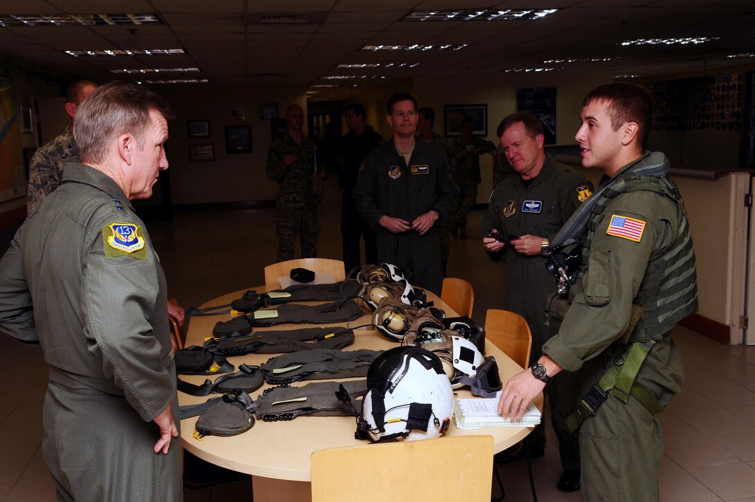 ANDERSEN AIR FORCE BASE, Guam -- Lt. Gen. Hawk Carlisle, left, commander of 13th Air Force, recieves pre-flight instruction from a crew member of Helicopter Sea Combat Squadron 25,  here on Jan. 14. This is the general's first visit to Andersen since assuming command of 13th Air Force. (U.S.Air Force photo by Airman 1st Class Jeffrey Schultze)