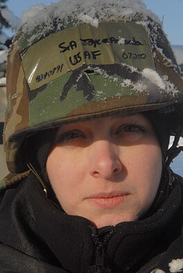 KUNSAN AIR BASE, Republic of Korea -- Senior Airman Amanda Joyce, a fuels systems journeyman assigned to the 8th Maintenance Squadron, defends her control entry point during the Peninsula-wide Operational Readiness Exercise here, Jan. 14. Wolf Pack members perform PENOREs like this one to prepare for wartime conditions. (U.S. photo/Senior Airman Roy Lynch)