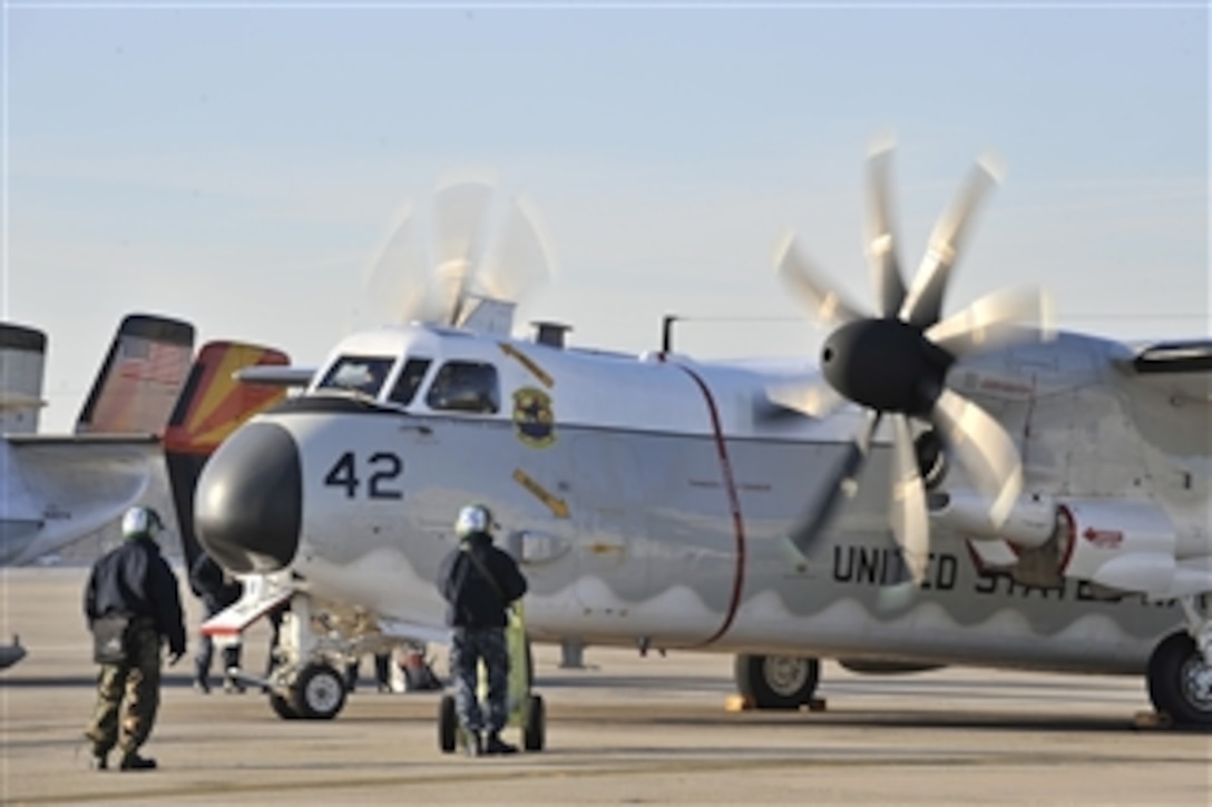 U.S. Navy C-2A Greyhound transport aircraft from Fleet Logistics Support Squadron 40 prepare to deploy from Norfolk, Va., to support the first wave of earthquake relief efforts in Haiti on Jan. 14, 2010.  This is part of a larger relief effort spearheaded by the U.S. government to help those affected by the 7.0 magnitude earthquake.  