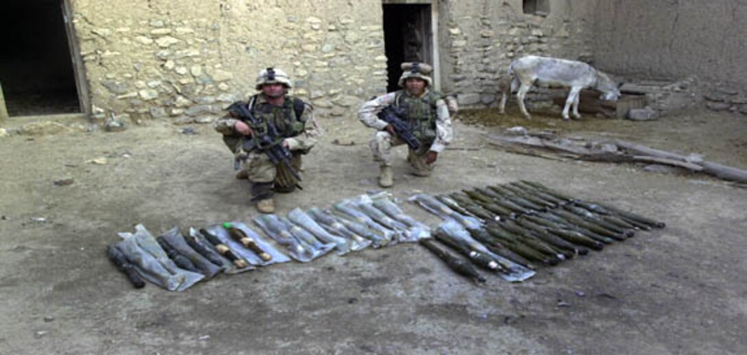 020810-A-4385T-053 A cache of RPG rounds were found and confiscated by the 3-505th infantry out of Fort Bragg, N.C., in Gangikhel a town in  Malikasay, Afghanistan, on Aug. 10, 2002. Their overall mission is to seek out enemy forces and locate any possible cache's in the area.  (U.S. Army photo by Sgt. Sean A. Terry) (Released)