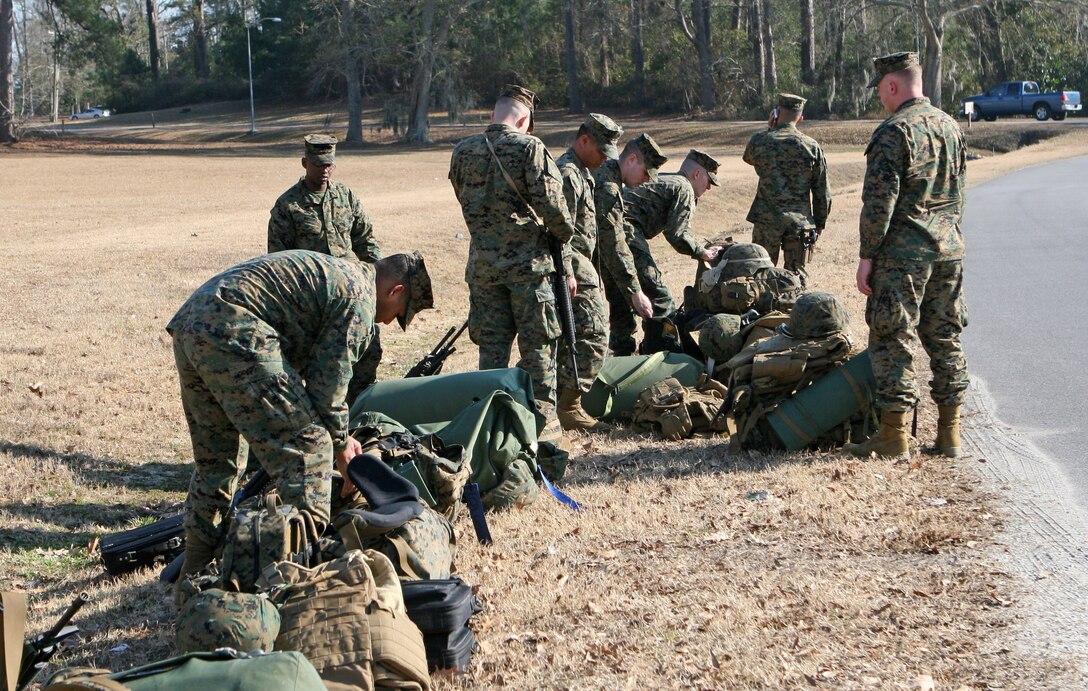 Marines from the 22nd Marine Expeditionary stage gear aboard Camp Lejeune, N.C. Jan. 15, 2010, in preparation for a deployment to Haiti to provide humanitarian assistance and disaster relief mission to the country. The 22nd Marine Expeditionary Unit is embarked aboard the ships of the Bataan Amphibious Ready Group en route to Haiti to provide humanitarian assistance and disaster relief in the wake of a devastating earthquake that rocked the country Jan. 12, 2009. The 22nd MEU is a multi-mission capable force comprised of Aviation Combat Element, Marine Heavy Helicopter Squadron 461 (Reinforced); Logistics Combat Element, Combat Logistics Battalion 22; Ground Combat Element, Battalion Landing Team, 3rd Battalion, 2nd Marine Regiment; and its command element. (Official Marine Corps Photo by Cpl. Theodore W. Ritchie)