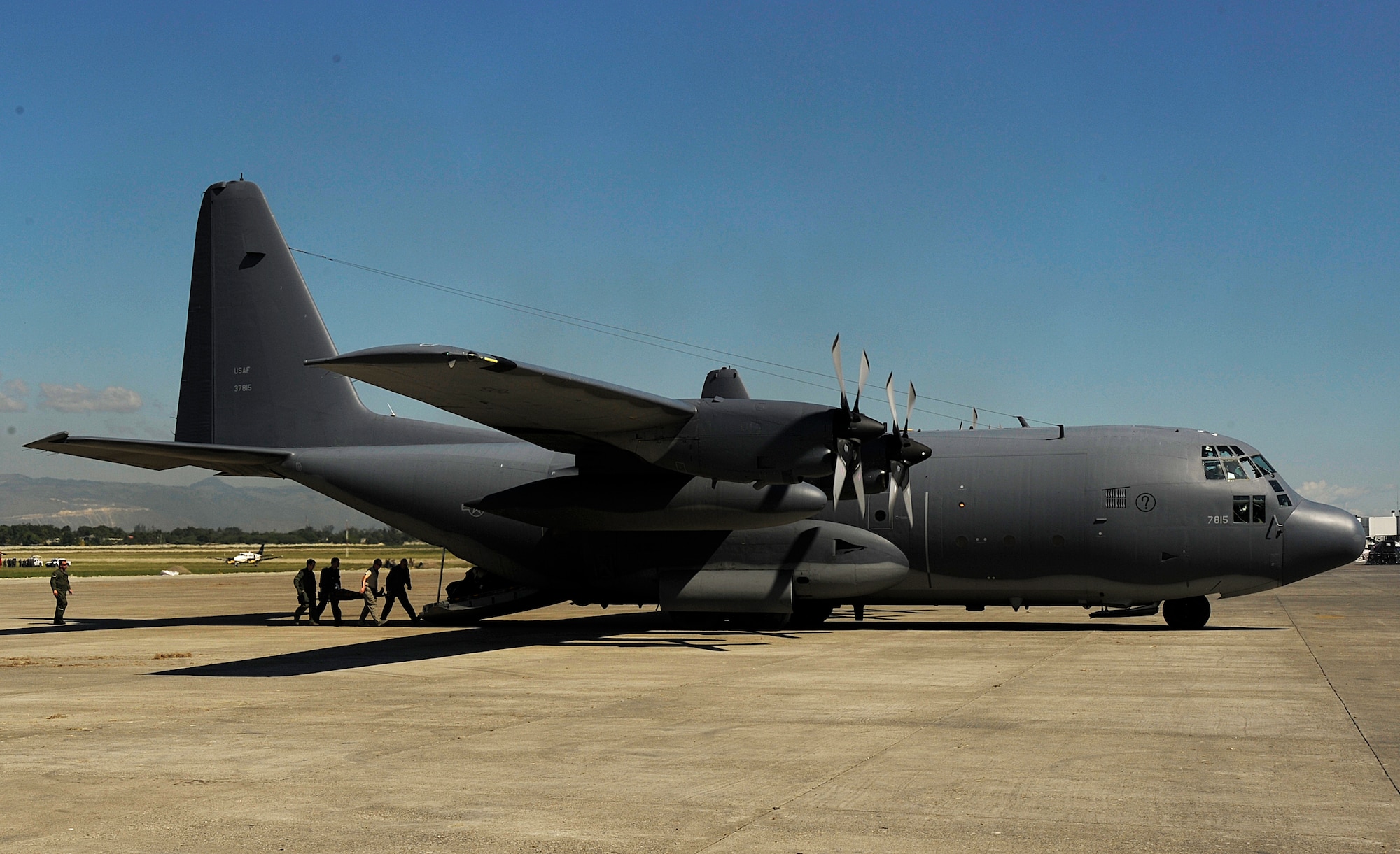 U.S. Airmen from the Air Force Special Operations Command (AFSOC), Hurlburt Field, Fla., load injured people aboard a C-130 Hercules aircraft Jan. 15, 2010, after the earthquake in Port-au-Prince, Haiti. AFSOC is providing an immediate rapid response capability to Haiti through U.S. Southern Command. (U.S. Air Force photo by Master Sgt. Russell E. Cooley IV/Released)