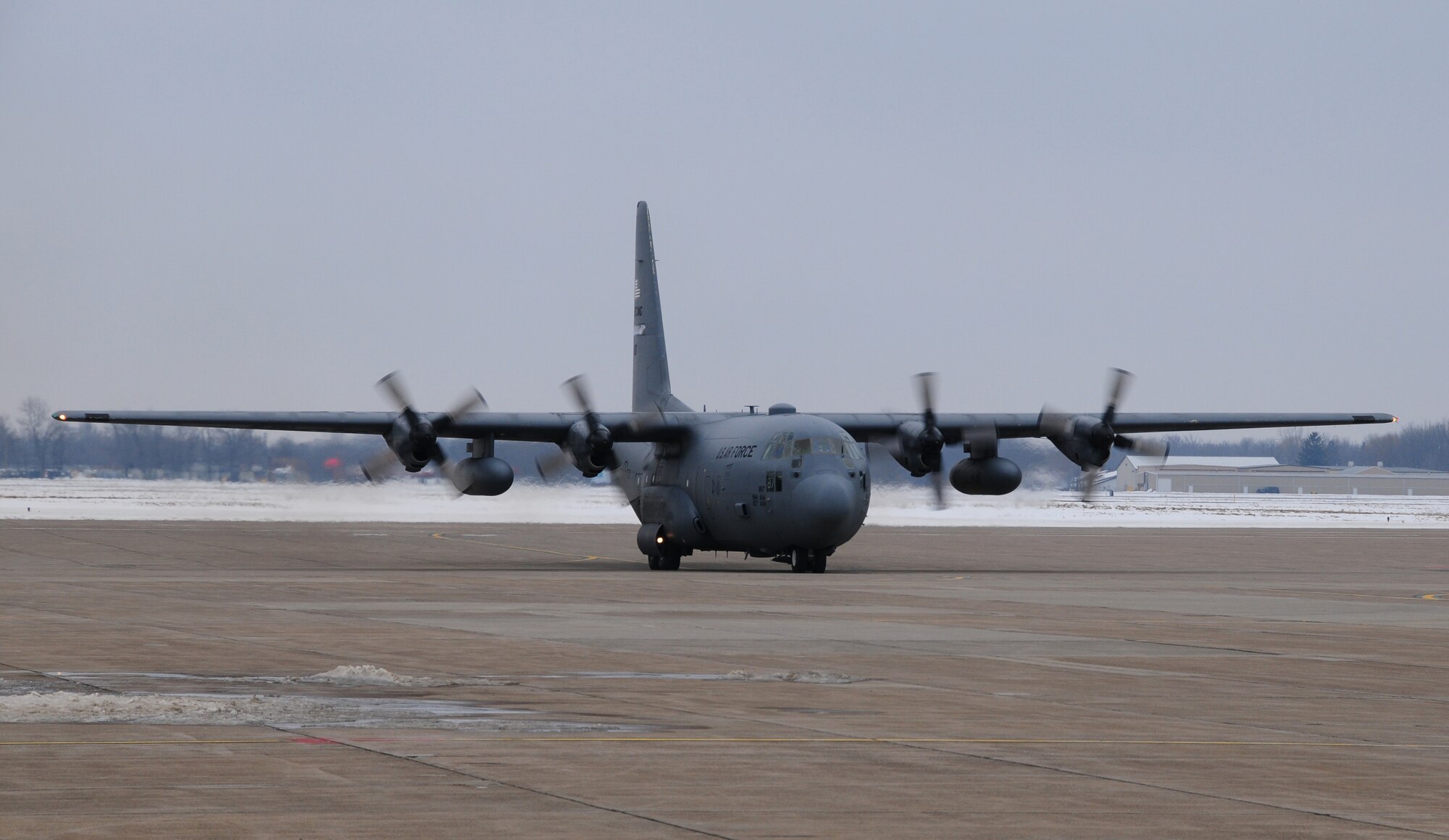 NIAGARA FALLS AIR RESERVE STATION, NIAGARA FALLS, NY-- A C-130 carrying returning members of the 914th Airlift Wing taxis, January 16. (U.S. Air Force photo by Staff Sgt Stephanie Clark) 