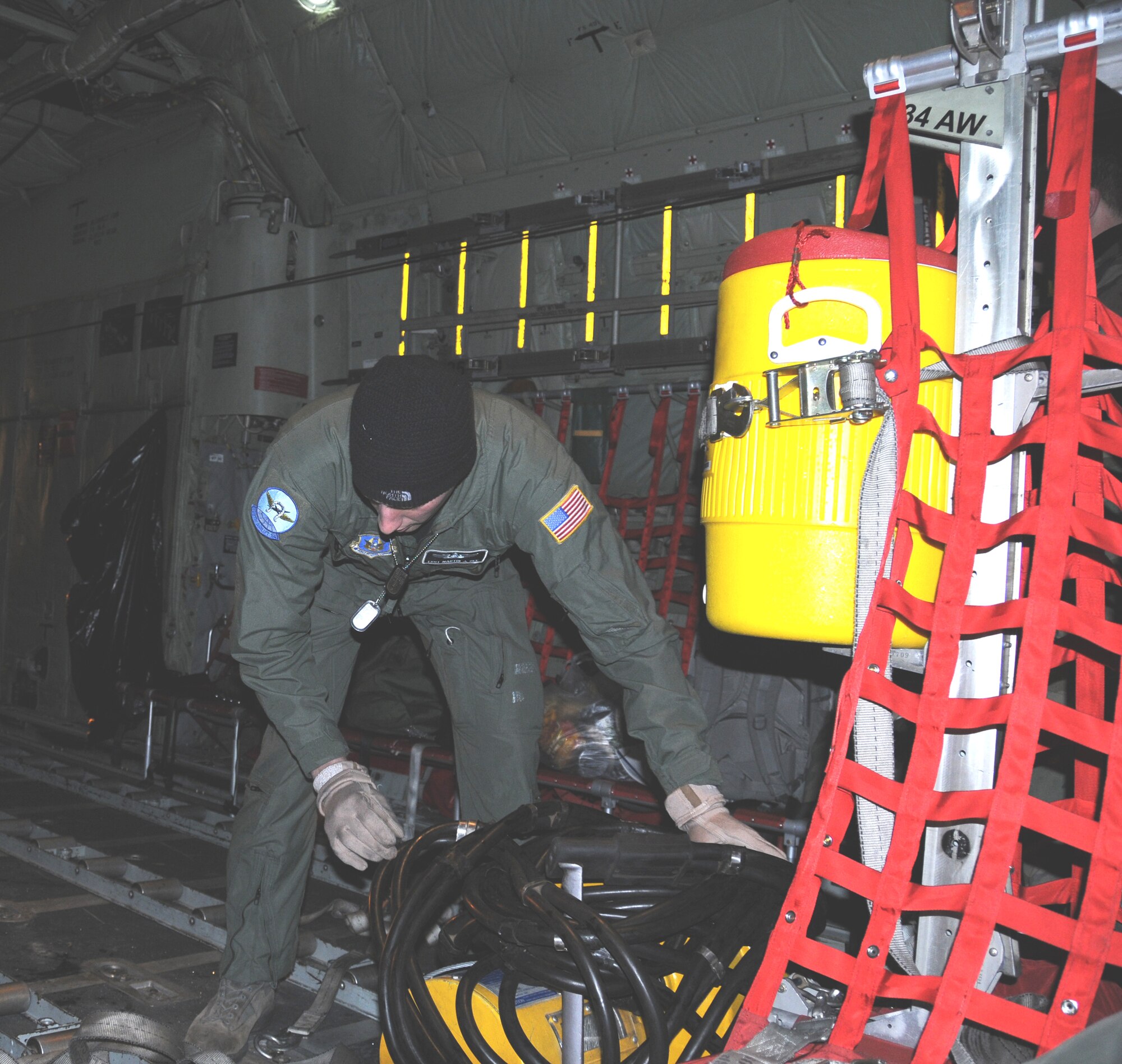 The 107th Airlift Wing, New York Air National Guard along with the 914th Airlift Wing, Air Force Reserves were tasked to send two fully crewed C-130s to aid in the humanitarian efforts in Haiti. In the early morning hours of Jan. 16, crew members secured the cargo area in preparation of take-off. The crews will spend the next five days airlifting supplies in to the affected area.   
"We're going down to help people in dire need right now," said Sgt. Szpaicher.  "We're trying to give the people some kind of comfort and relief," he added. 
