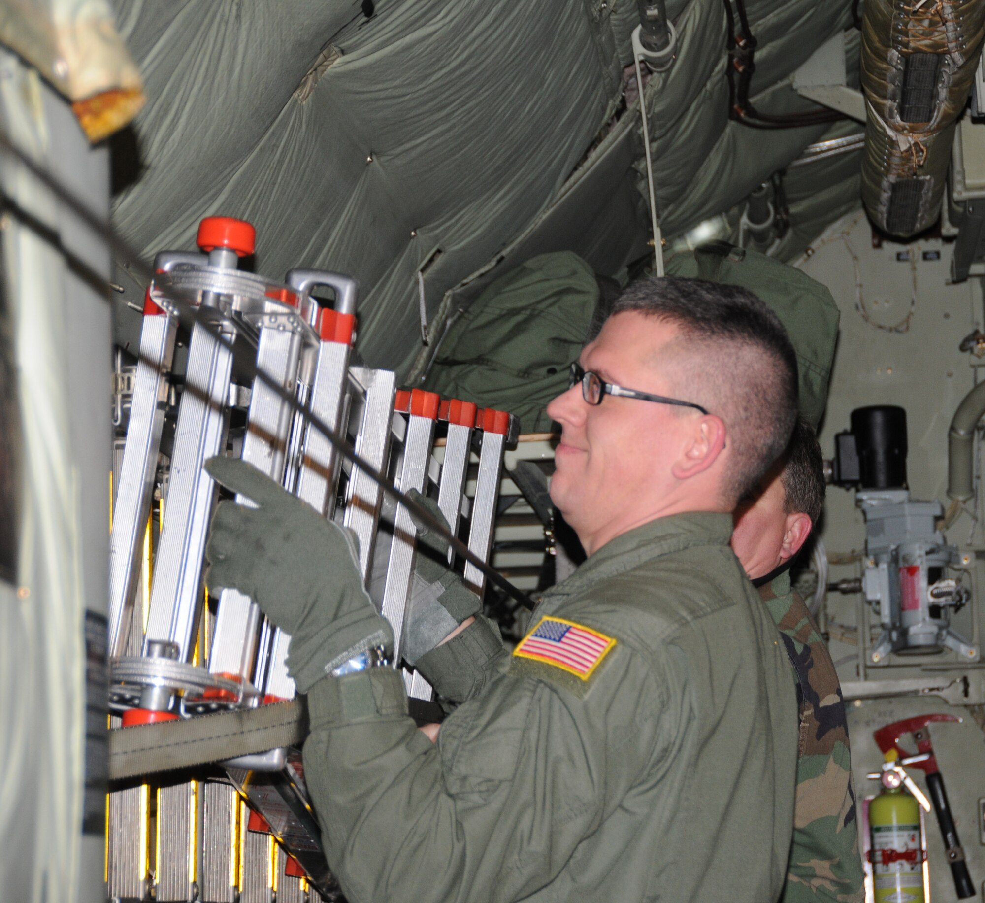 The 107th Airlift Wing, New York Air National Guard along with the 914th Airlift Wing, Air Force Reserves were tasked to send two fully crewed C-130s to aid in the humanitarian efforts in Haiti. In the early morning hours of Jan. 16, Master Sgt. Scott Dixon, 107th AW C-130 Loadmaster and Master Sgt. Ronald Szpaicher, 107th AW C-130 Crew Chief secured the cargo area for take-off. The Two sergeants will spend the next five days airlifting supplies in to the affected area.   
"We're going down to help people in dire need right now," said Sgt. Szpaicher.  "We're trying to give the people some kind of comfort and relief," he added. 

