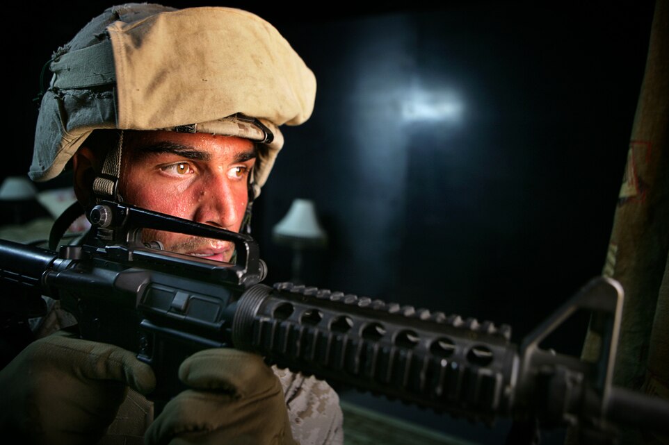 Pvt. James C. Colucci, from Santa Rosa, Calif., helps search for a simulated captured Marine during counterinsurgency training at Forward Operating Base Gerber here Jan. 16. The Marines of Company G later found the Marine after building trust and gathering intelligence from role players portraying Afghans. The company’s Marines serve as the mechanized assault force for the 11th Marine Expeditionary Unit’s ground combat element, Battalion Landing Team 2/4, aka the Magnificent Bastards.
