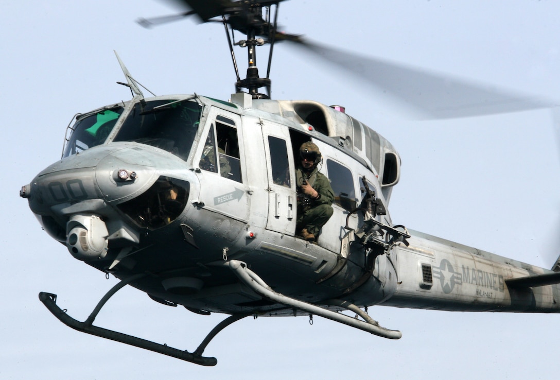 A UH-1N helicopter from Marine Heavy Helicopter Squadron 461 (Reinforced), 22nd Marine Expeditionary Unit, prepares to land aboard multi-purpose amphibious assault ship USS Bataan as the ship steams toward Haiti Jan. 16, 2010. The 22nd Marine Expeditionary Unit is embarked aboard the ships of the Bataan Amphibious Ready Group en route to Haiti to provide humanitarian assistance and disaster relief in the wake of a devastating earthquake that rocked the country Jan. 12, 2009. The 22nd MEU is a multi-mission capable force comprised of Aviation Combat Element, Marine Heavy Helicopter Squadron 461 (Reinforced); Logistics Combat Element, Combat Logistics Battalion 22; Ground Combat Element, Battalion Landing Team, 3rd Battalion, 2nd Marine