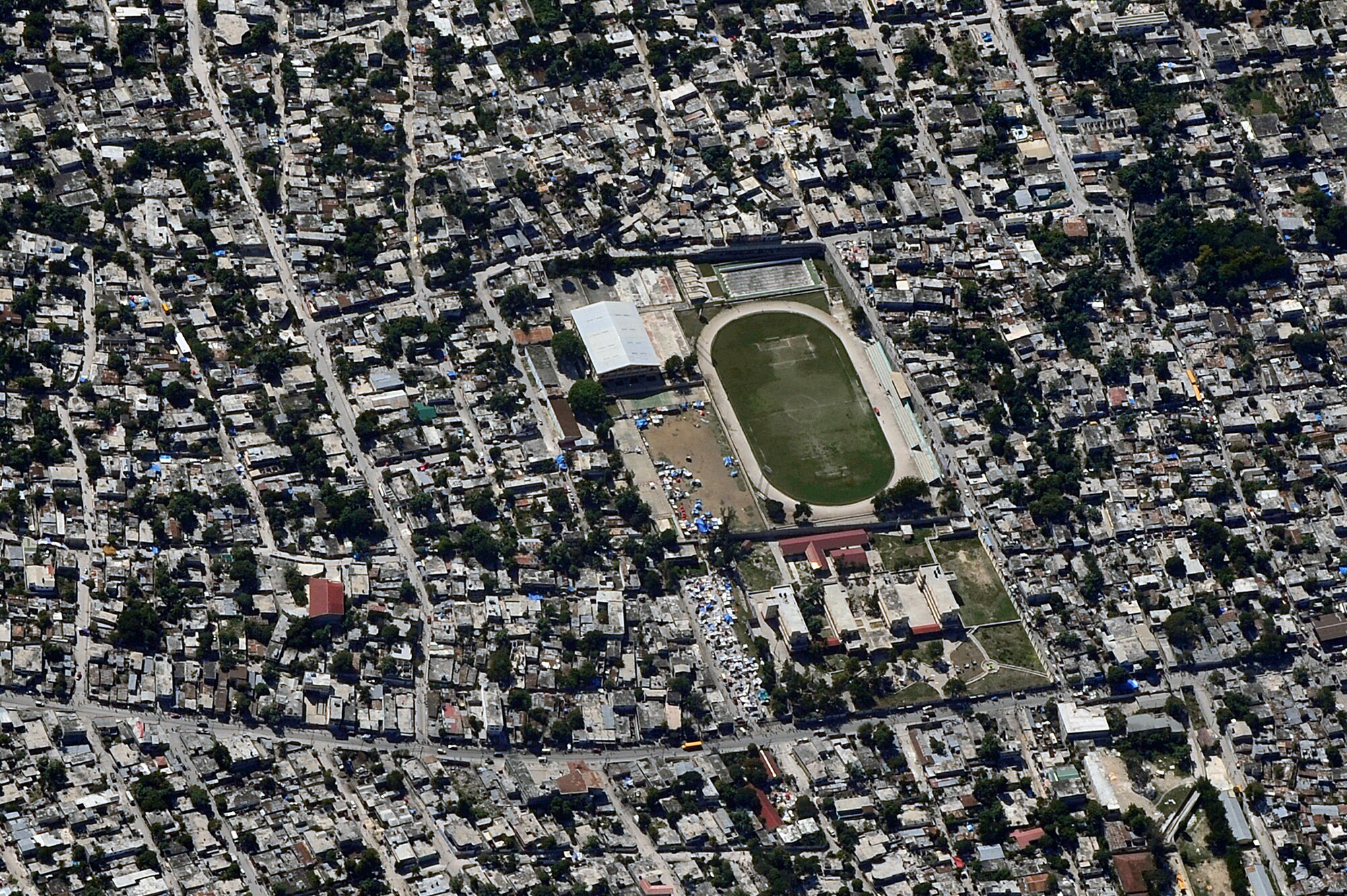 An aerial view of Port-au-Prince, Haiti from an OC-135B Observation Aircraft Jan. 14. The OC-135B flew over Haiti for over three hours taking panoramic photos to help coordinate U.S. military support to the Haiti relief effort. (U.S. Air Force photo by Airman 1st Class Perry Aston) (Released)
