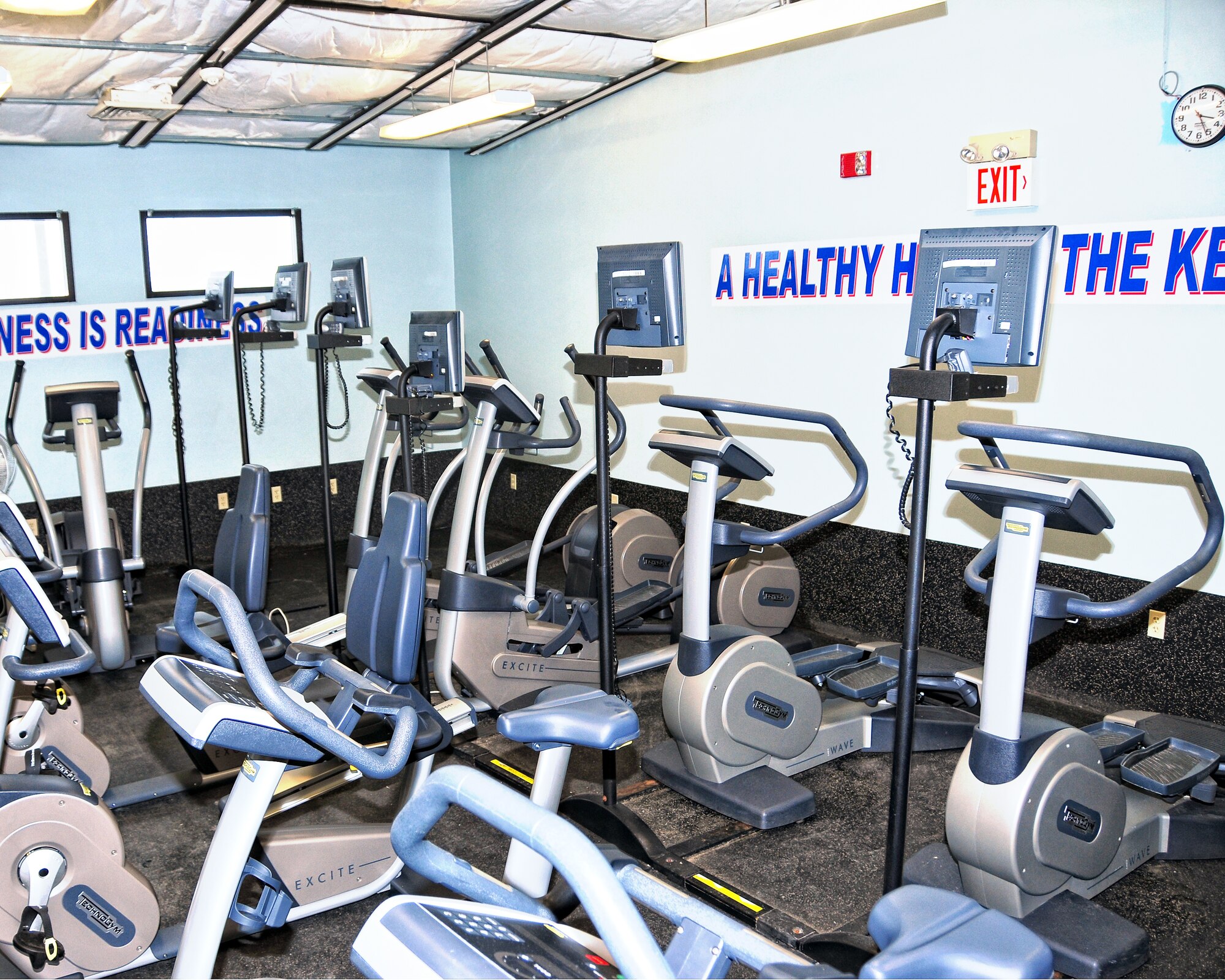 New treadmills and ellipticals are installed at the Niagara Falls Air Reserve Station, January 16, 2010, Niagara Falls, NY. 8 AM, Tuesday January 19, the reopening of the base gym will feature new state of the art treadmills and ellipticals. With PT training twice a year what better time to take advantage of this new equipment. The gym staff is available to answer any questions and to help set up a physical fitness program to get you ready for the new PT standards. (U.S. Air Force photo by Staff Sgt Joseph McKee)