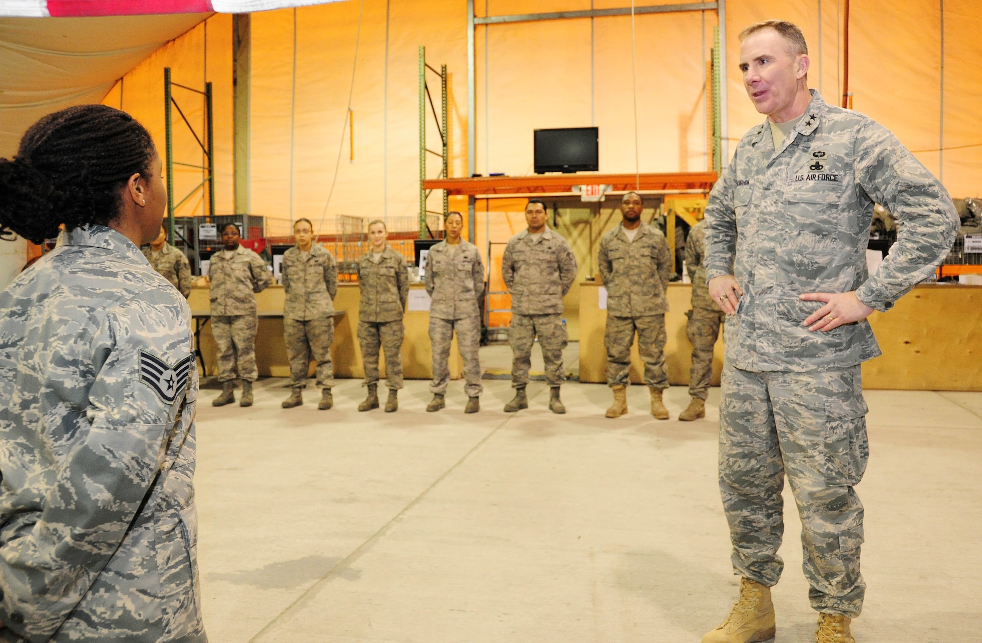 TRANSIT CENTER AT MANAS, Kyrgyzstan - Maj. Gen. Robert H. McMahon Director of Logistics, Deputy Chief of Staff for Logistics, Installations and Mission Support, Headquarters U.S. Air Force, Washington D.C. speaks to Airmen from the 376th Expeditionary Logistics Readiness Squadron, Expeditionary Theater Distribution Center during a site visit here Jan. 17. (U.S. Air Force photo by Senior Airman Nichelle Anderson)