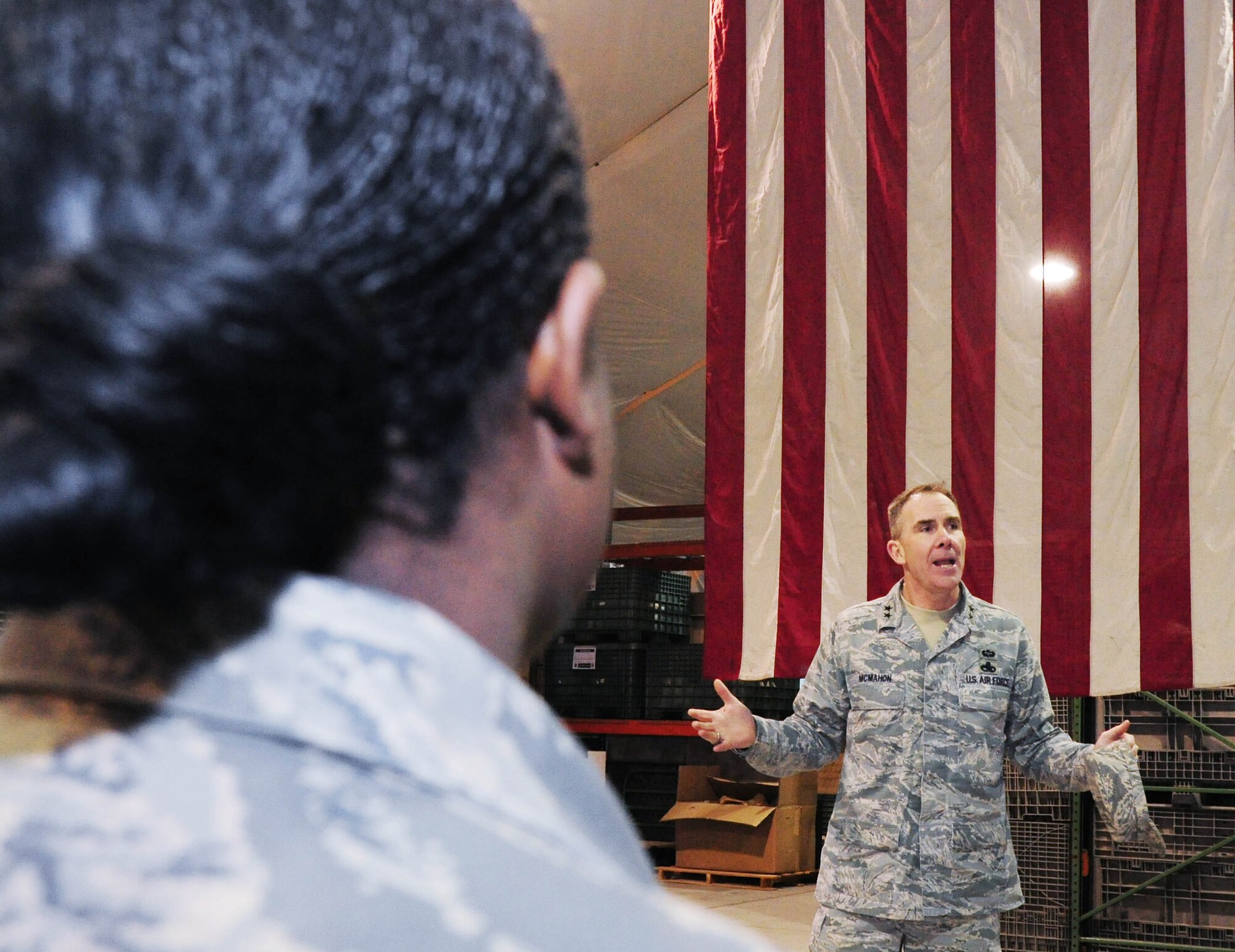 TRANSIT CENTER AT MANAS, Kyrgyzstan - Maj. Gen. Robert H. McMahon, Director of Logistics, Deputy Chief of Staff for Logistics, Installations and Mission Support, Headquarters U.S. Air Force, Washington D.C., speaks to Airmen from the 376th Expeditionary Logistics Readiness Squadron’s Expeditionary Theater Distribution Center during a site visit here Jan. 17. (U.S. Air Force photo by Senior Airman Nichelle Anderson)