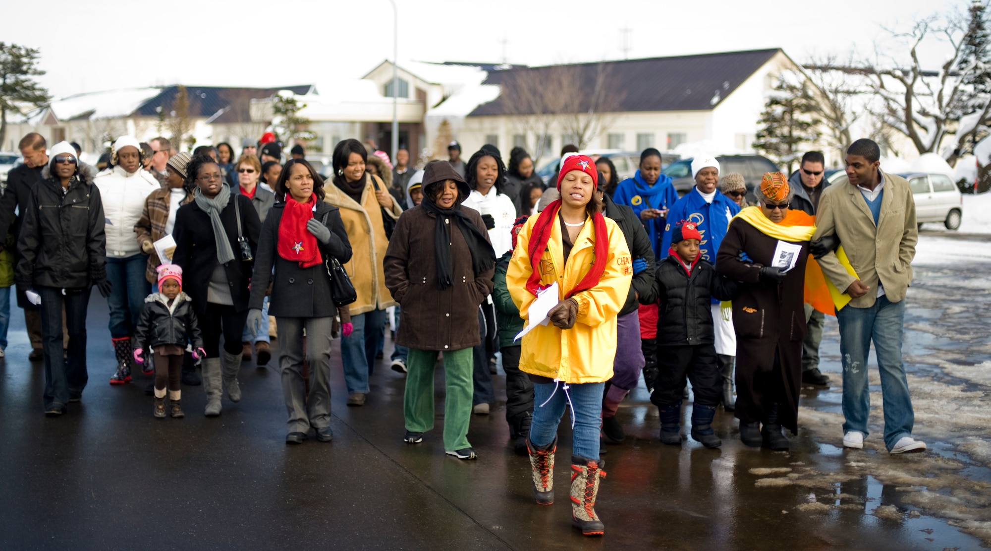 MISAWA AIR BASE, Japan -- Members of the Misawa community march their way around Risner Circle on Martin Luther King Jr. Day Jan. 18. The event was used to commemorate the life and accomplishments of Dr. King and was followed by a service at the base chapel. (U.S. Air Force photo/Senior Airman Jamal D. Sutter)