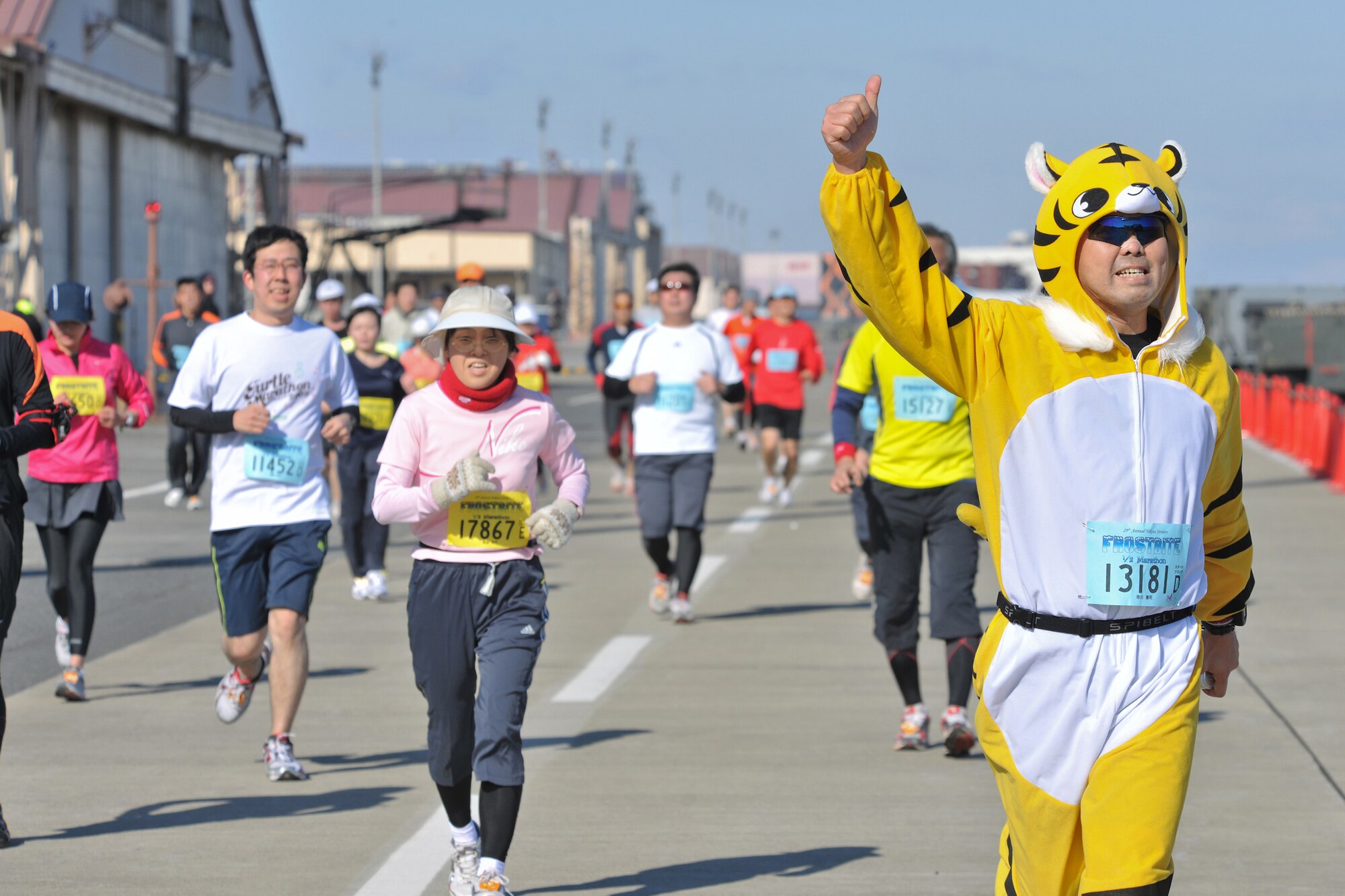 YOKOTA AIR BASE, Japan -- A runner dressed as a Tiger participates in the 29th Annual Frostbite Race, Jan. 17.  Some runners wore tiger costumes, because 2010 is the Chinese zodiac sign of the Tiger. Some of the 9,000 runners who participated chose to wear costumes, because it has become an established custom every year. (U.S. Air Force photo/Osakabe Yasuo)