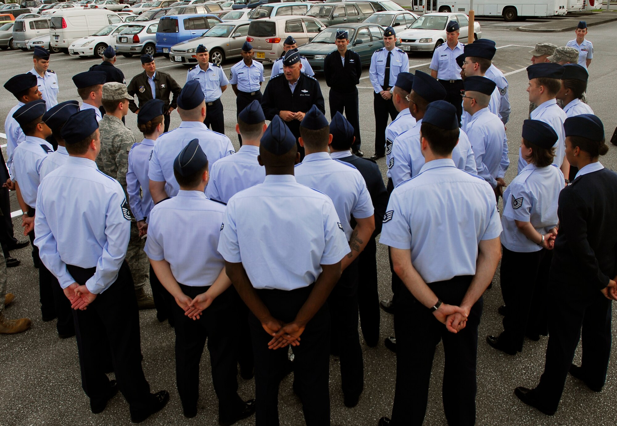 Gen. Gary North, Pacific Air Forces commander, speaks to Airmen from the 18th Communications Squadron at Kadena Air Base, Jan. 11. General North, who served as 18th Wing commander here from 2000 to 2002, spent several days at Kadena visiting with Airmen and also had the opportunity to fly with the 33rd Rescue Squadron and the 67th Fighter Squadron. This was the general’s first visit to Kadena since taking command of Pacific Air Forces in August 2009. (U.S. Air Force photo/Airman 1st Class Chad Warren)