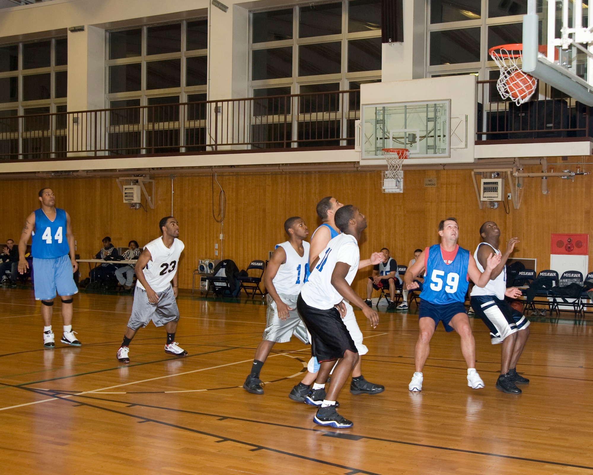 MISAWA AIR BASE, Japan -- Brig. Gen. H Brent Baker Sr., Pacific Air Forces  Director of Logistics, participates in an intramural basketball game between the 35th Logistics Readiness Squadron and the 35th Maintenance Squadron at the Potter Fitness Center Jan 13. During the game General Baker played for both teams. His efforts contributed to a LRS victory over MXS, 58-49. (U.S. Air Force photo/Tech. Sgt. Russell J. McBride)