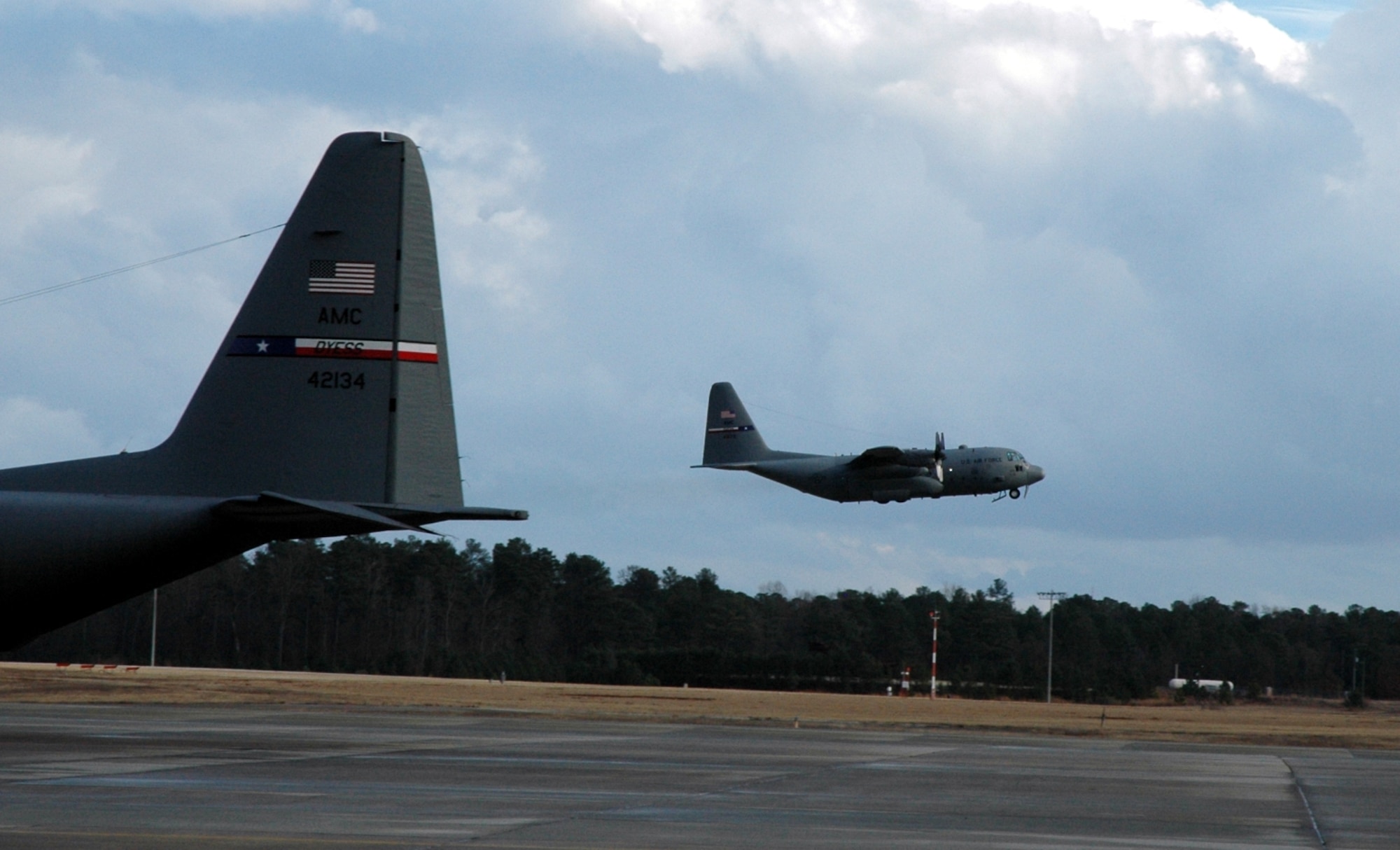 DYESS AIR FORCE BASE, Texas -- 
A 317th Airlift Group C-130 Hercules takes off Jan. 17 from an East Coast Air Force Base. The C-130 crew of six departed Dyess Air Force Base to support relief efforts following the 7.0-magnitude earthquake that devistated the Caribbean nation Jan. 14. The Air Force's airlift capability enables the United States to respond immediately to any disaster domestically or worldwide. We are the only country with an aircraft fleet capable of providing this type of response.
