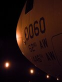 A McChord AFB C-17 waits on the flightline after being loaded with cargo at Charleston AFB Jan. 18. Members of the 437th Aerial Port Squadron and 10th Airlift Squadron loadmasters worked together to load 16 pallets of humanitarian aid, which weighed approximately 116,000 pounds and included more than 40,000 bottles of water and 30,000 meals. The supplies were flown out of Charleston AFB at approximately 6:30 a.m. on the first mission to leave the base since it assumed the role of a distribution hub for food and water to Haiti. (U.S. Air Force photo/Staff Sgt. Daniel Bowles)