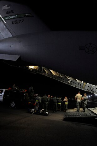 A C-17 aircraft from McChord Air Force Base, Wash. is unloaded at MacDill Air Force Base Jan. 18. The C-17 was full of medical supplies along with a Mobile Aeromedical Staging Facility team from the 6th Air Mobility Wing headed to Haiti to provide medical aide to the victims of last weeks earthquake.
(U.S. Air Force photo by Staff Sgt. Joseph Swafford) 