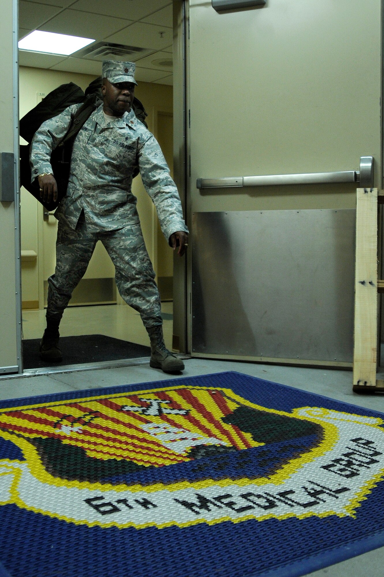 Maj. Christopher Joseph, 6th Medical Group Mobile Aromedical Staging Facility team chief, leaves the clinic before boarding a bus to the flight line at MacDill Air Force Base Jan. 17. The MASF team was headed to Haiti to provide medical aide to the victims of last weeks earthquake.
(U.S. Air Force photo by Staff Sgt. Joseph Swafford) 