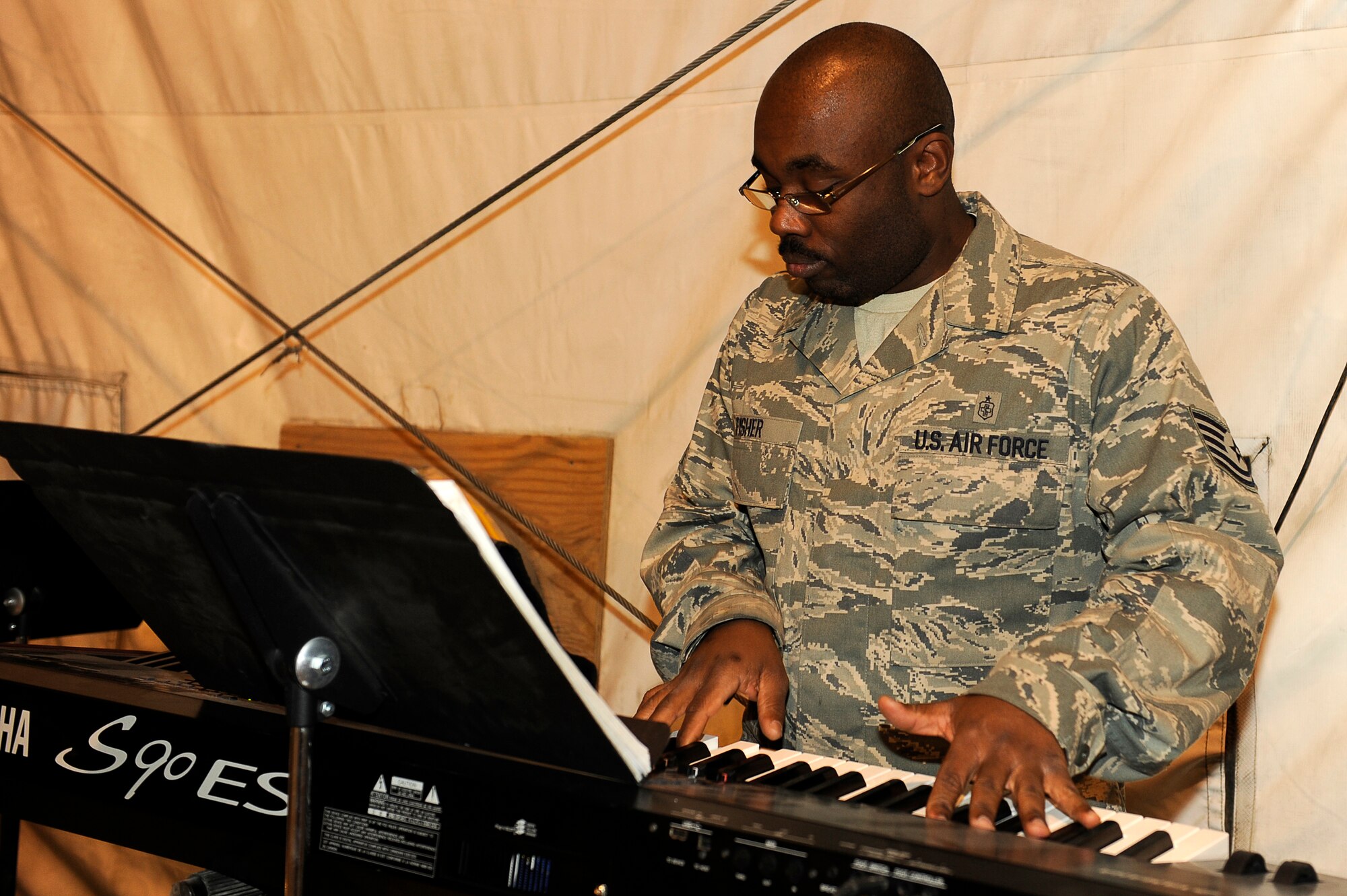 BAGRAM AIRFIELD, Afghanistan--U.S. Air Force Tech. Sgt. Shannon Fisher, Task Force Medical, plays a keyboard during a music performance celebrating Dr. Martin Luther King Jr., Jan. 15, 2010. Coalition Forces celebrated the life of Dr. Martin Luther King Jr. during events at Bagram Airfield. (U.S. Air Force photo by: Tech. Sgt. Jeromy K. Cross)
