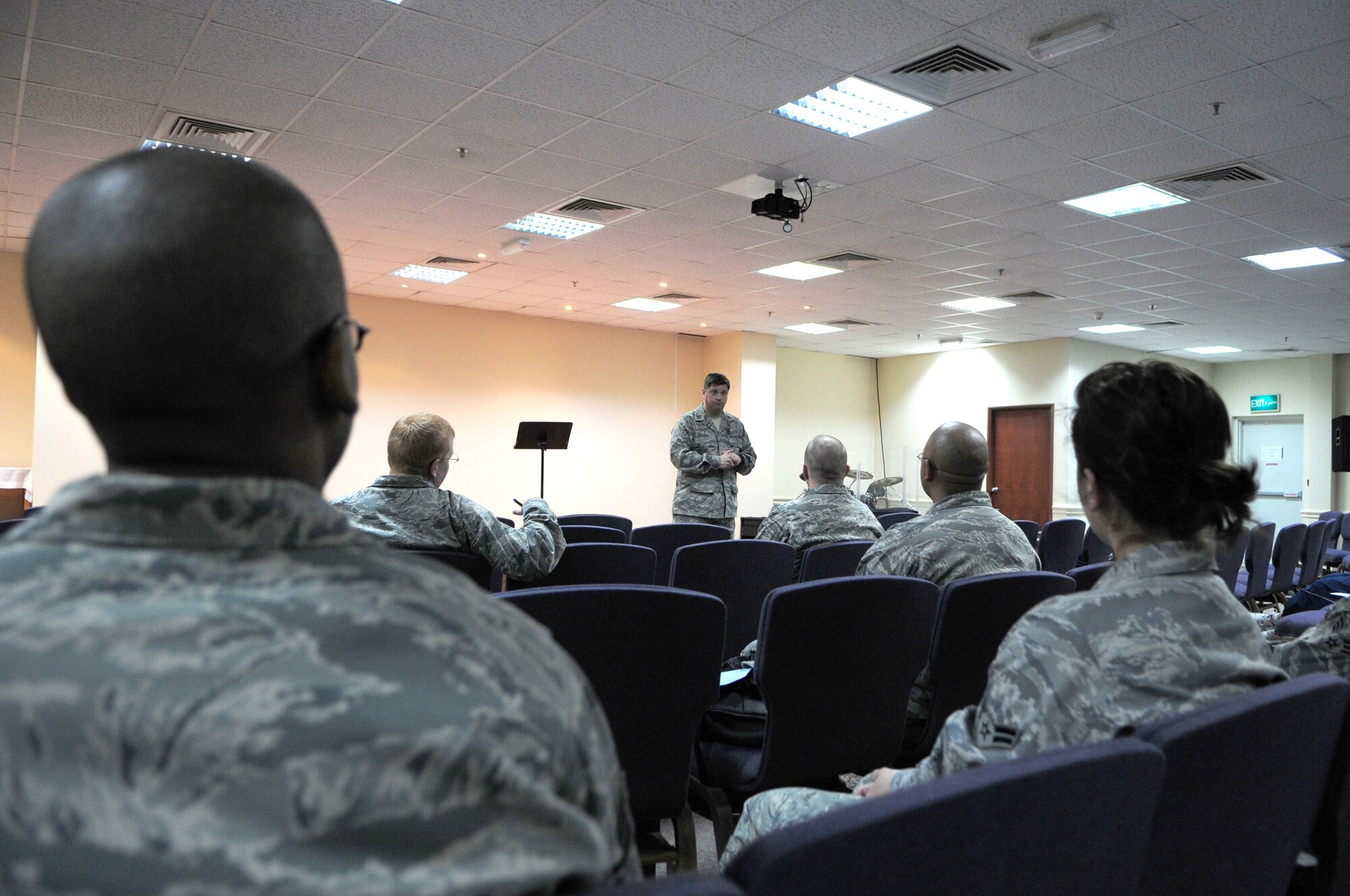 SOUTHWEST ASIA - U.S. Air Force Chaplain (Capt.) Chris Reeder, 386th Air Expeditionary Wing, instructs Airmen on how to fill out surveys after a "Love and Respect" marriage seminar taught by Dr. Emerson Eggerichs Jan. 16, 2010 at an air base in Southwest Asia. Dr. Eggerichs, author of the national bestseller "Love and Respect and Breaking the Communication Code" toured several bases within the area of responsibility recently covering the importance of communication within relationships. Prior to his "Love and Respect" conference career, which began in 1999, the doctor was the senior pastor of East Lansing's Trinity Church. (U.S. Air Force photo by Staff Sgt. Lakisha A. Croley/Released)