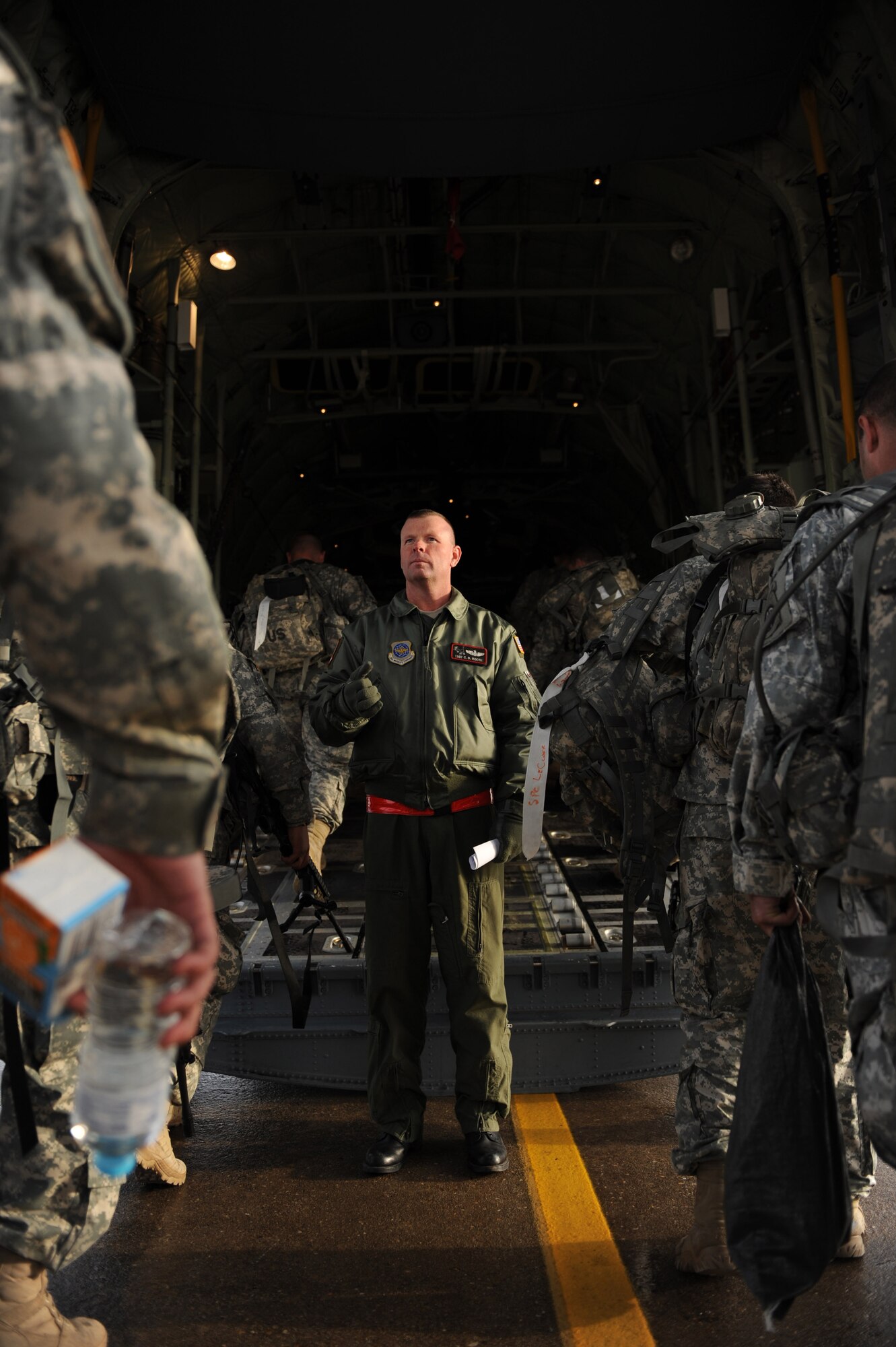 Soldiers from the 82nd Airborne Division, Ft. Bragg, N.C., board a Little Rock Air Force Base, Ark., C-130J Hercules at Pope Air Force Base, S.C., Jan. 16, 2010.  The C-130J aircraft will be transporting the Soldiers and various supplies to assist in Haitian relief efforts after a devastating earthquake struck the country Jan. 12, 2010. Little Rock AFB is a component of Air Mobility Command. Since relief operations began Jan. 13, 2010, AMC aircraft have deliver more than 323 tons of emergency tons of cargo to Haiti. (USAF Photo by Staff Sgt. Chad Chisholm) (RELEASED)