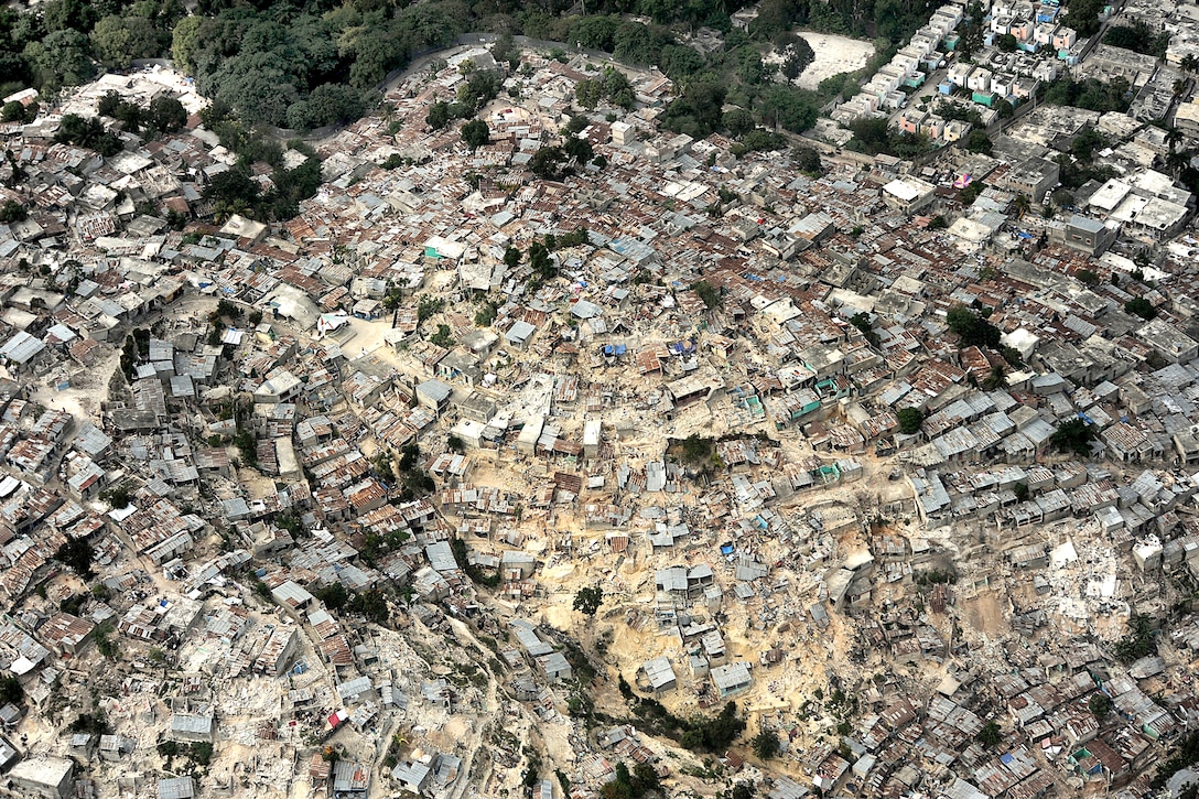Shown here Jan. 17, 2010, is an aerial view of downtown Port-au-Prince, Haiti. Makeshift shelters are being erected in open locations throughout the devastation following a 7.0-magnitude earthquake Jan. 12, 2010.