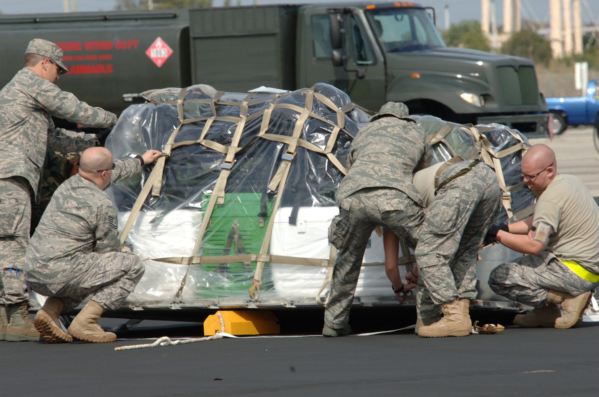 Airmen prepare supplies and relief packages for shipment to Haiti at Homestead Reserve Air Force Base in support of Operation Unified Response, Fla., Jan. 19. (U.S. Air Force photo by Tech. Sgt. Andy Bellamy)