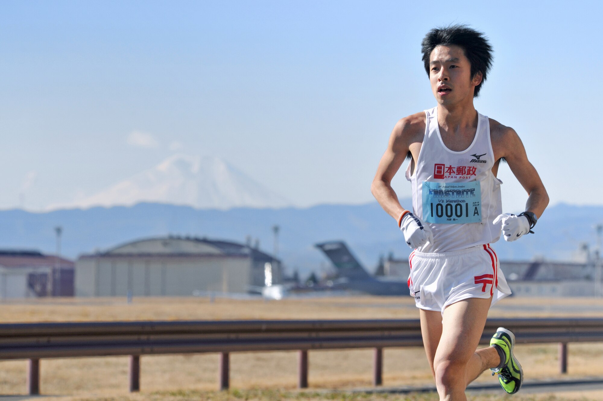 YOKOTA AIR BASE, Japan -- Yokota Striders Running Club sponsored the 29th Annual Frostbite Race here, Jan. 17. It was great weather with a clear view of Mt. Fuji, when 9,000 runners participated in the event. Youichi Kouno won first place by 1:07:08.  Kouno was the second place last year. (U.S. Air Force photo/Osakabe Yasuo)